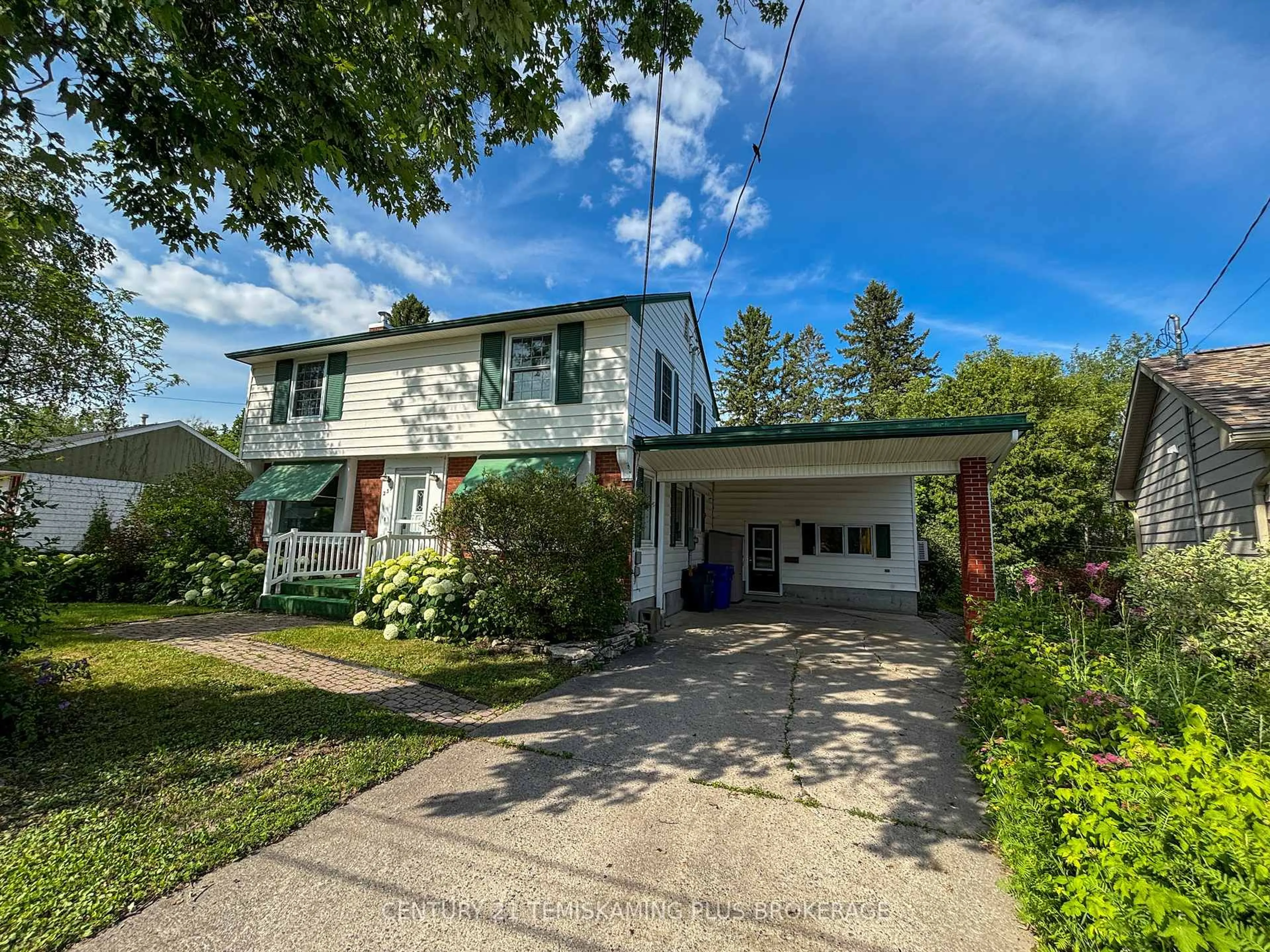 A pic from outside/outdoor area/front of a property/back of a property/a pic from drone, street for 233 Cherry Rd, Temiskaming Shores Ontario P0J 1P0