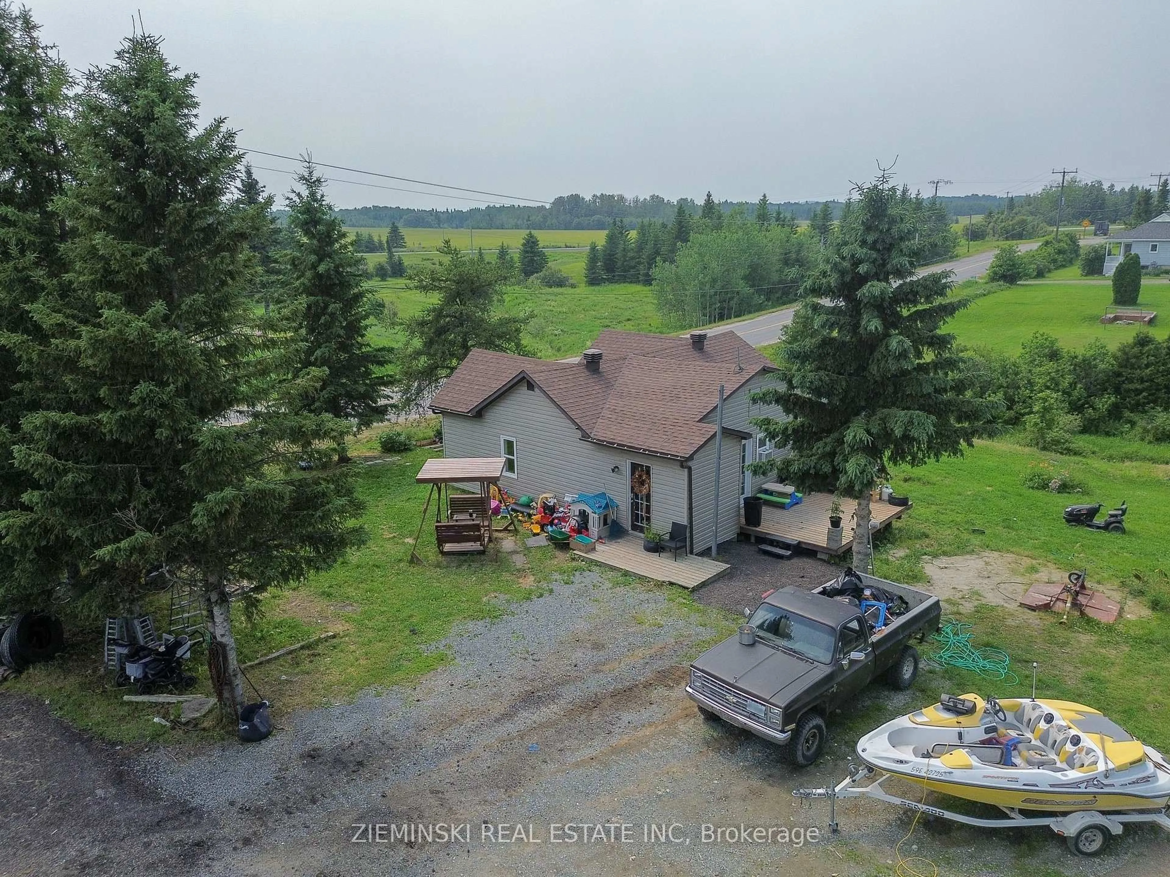 A pic from outside/outdoor area/front of a property/back of a property/a pic from drone, water/lake/river/ocean view for 1058 572 Highway, Black River Matheson Ontario P0K 1R0