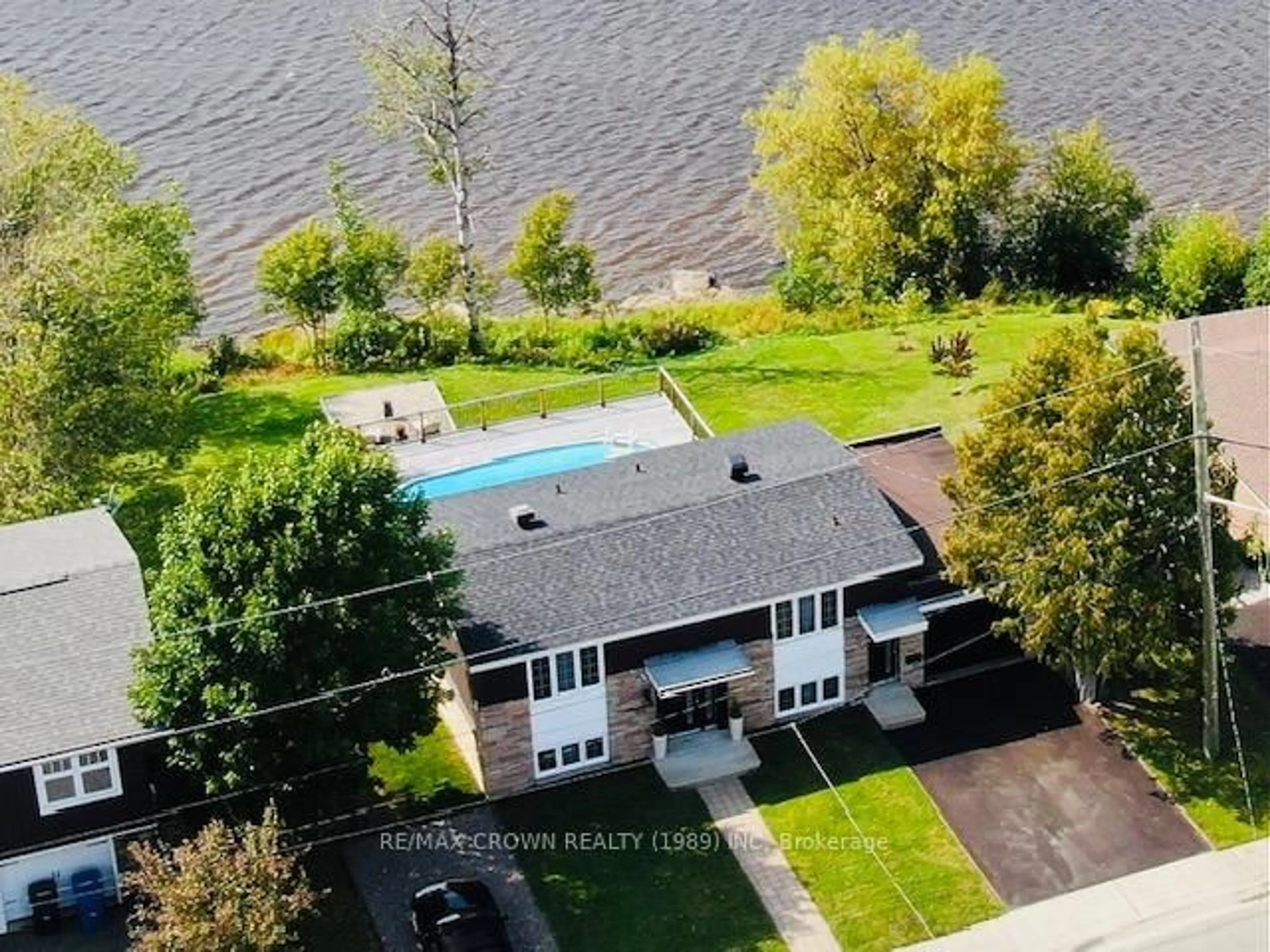 A pic from outside/outdoor area/front of a property/back of a property/a pic from drone, water/lake/river/ocean view for 17 A Park Cres, Kapuskasing Ontario P5N 1M6