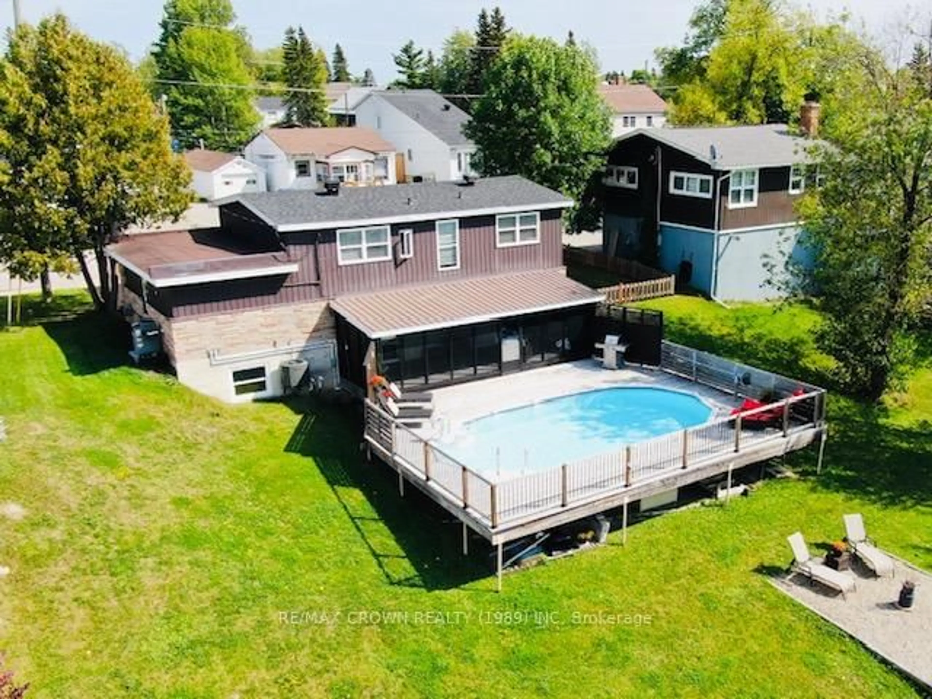 A pic from outside/outdoor area/front of a property/back of a property/a pic from drone, water/lake/river/ocean view for 17 A Park Cres, Kapuskasing Ontario P5N 1M6