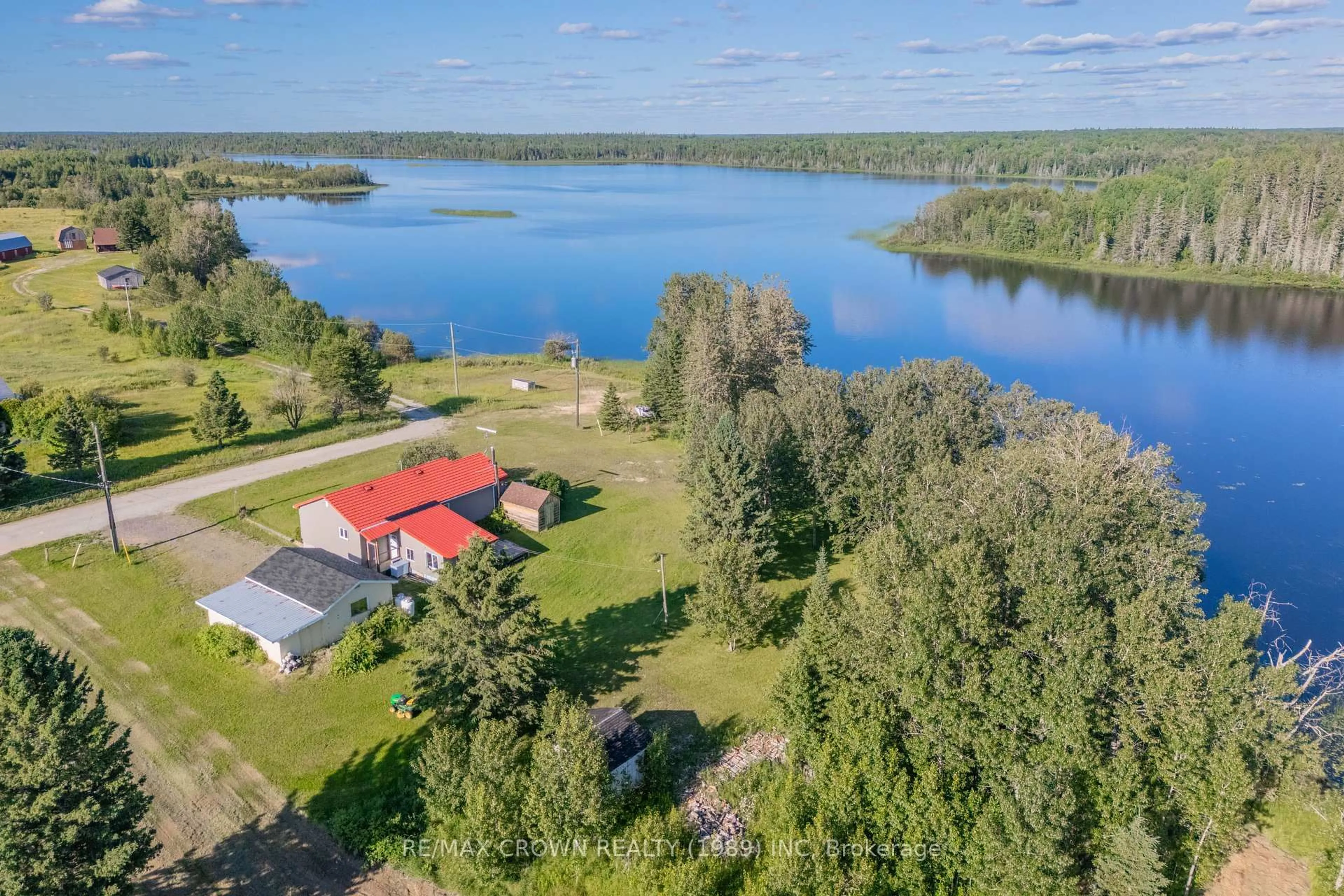 A pic from outside/outdoor area/front of a property/back of a property/a pic from drone, water/lake/river/ocean view for 560 Blais Rd, Kapuskasing Ontario P0L 1G0