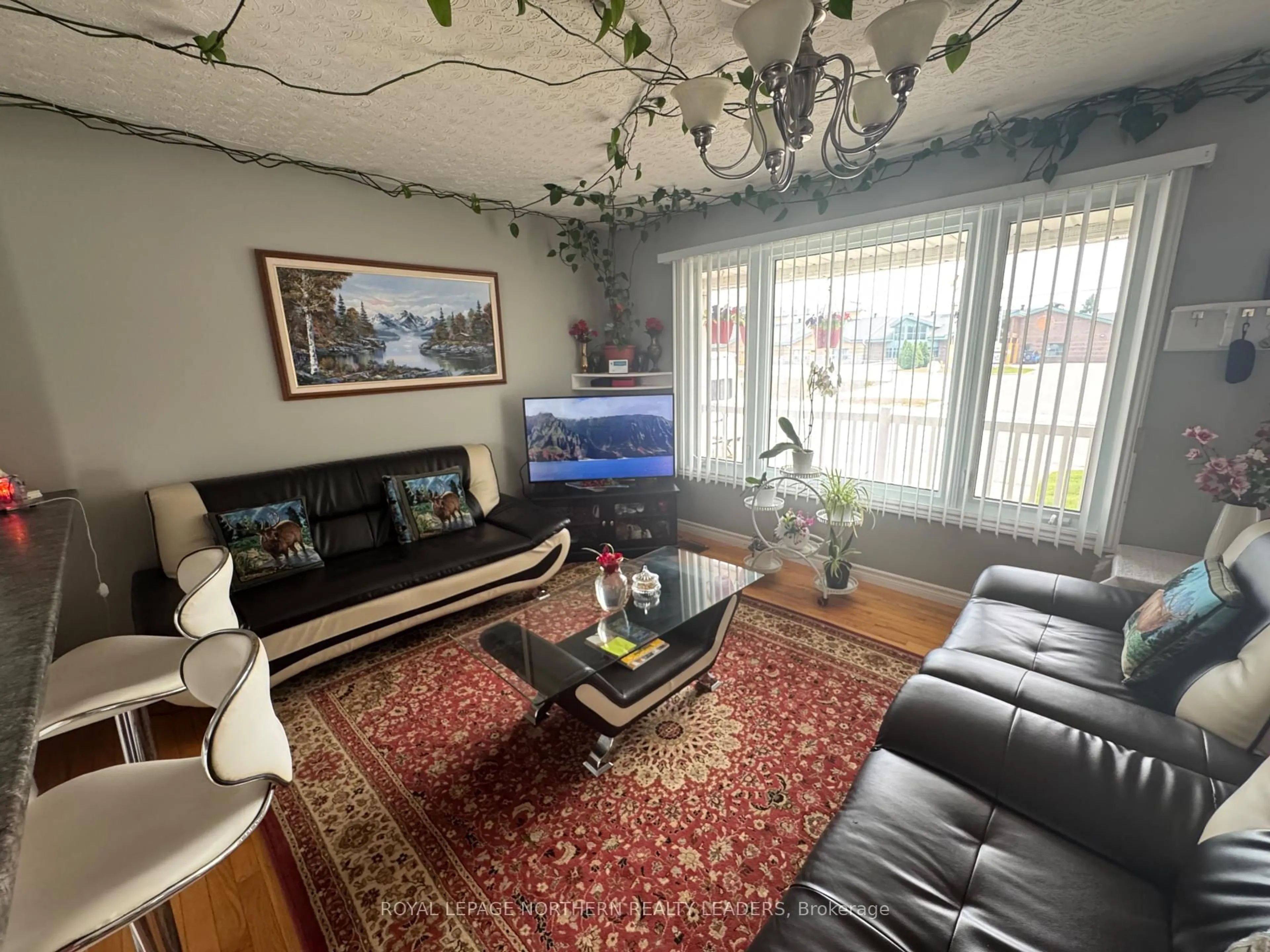 Living room with furniture, unknown for 880 Park Ave, Timmins Ontario P4N 3Y2