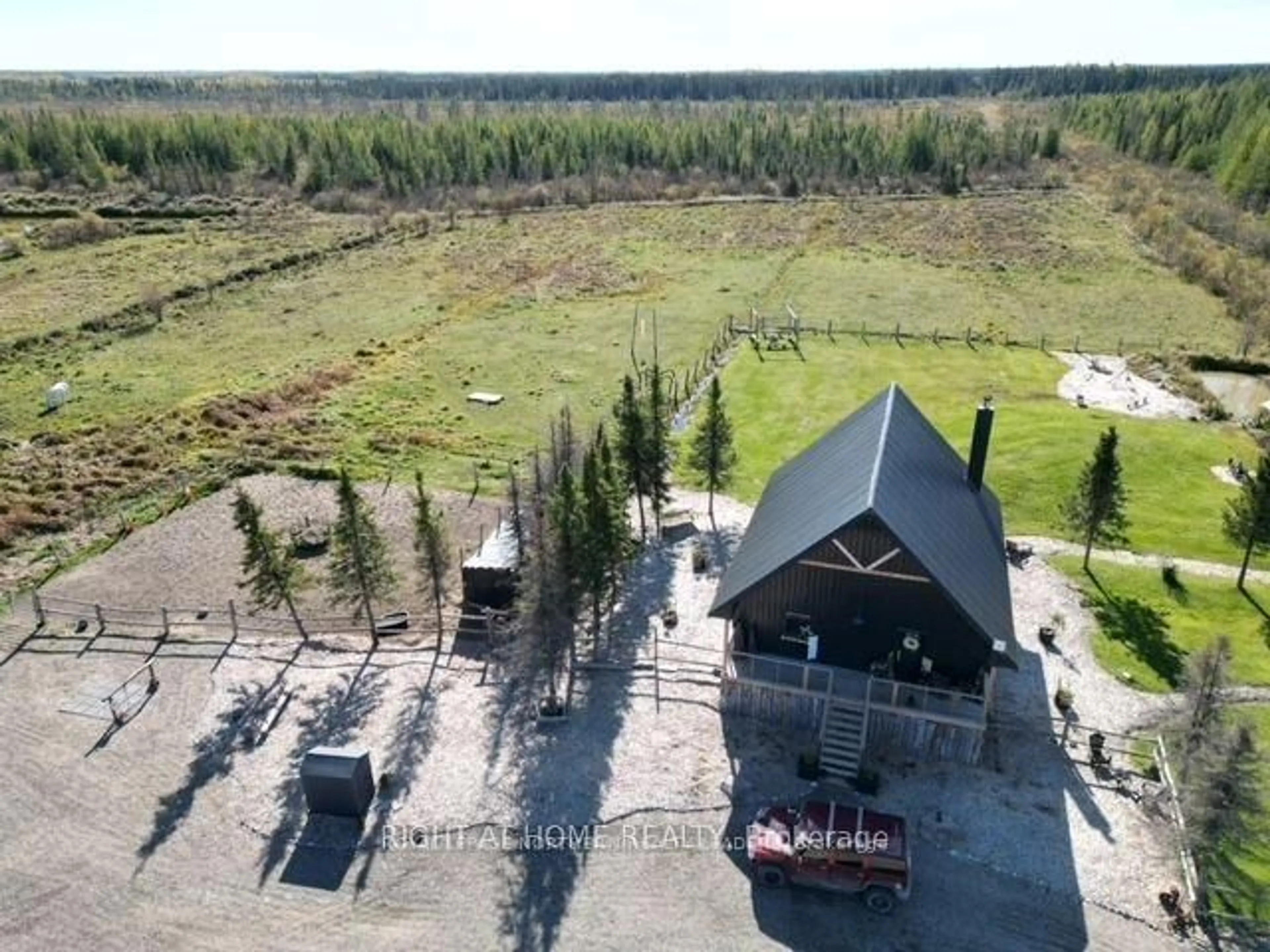 A pic from outside/outdoor area/front of a property/back of a property/a pic from drone, building for 680 Peltola Rd, Cochrane Ontario P0L 1C0