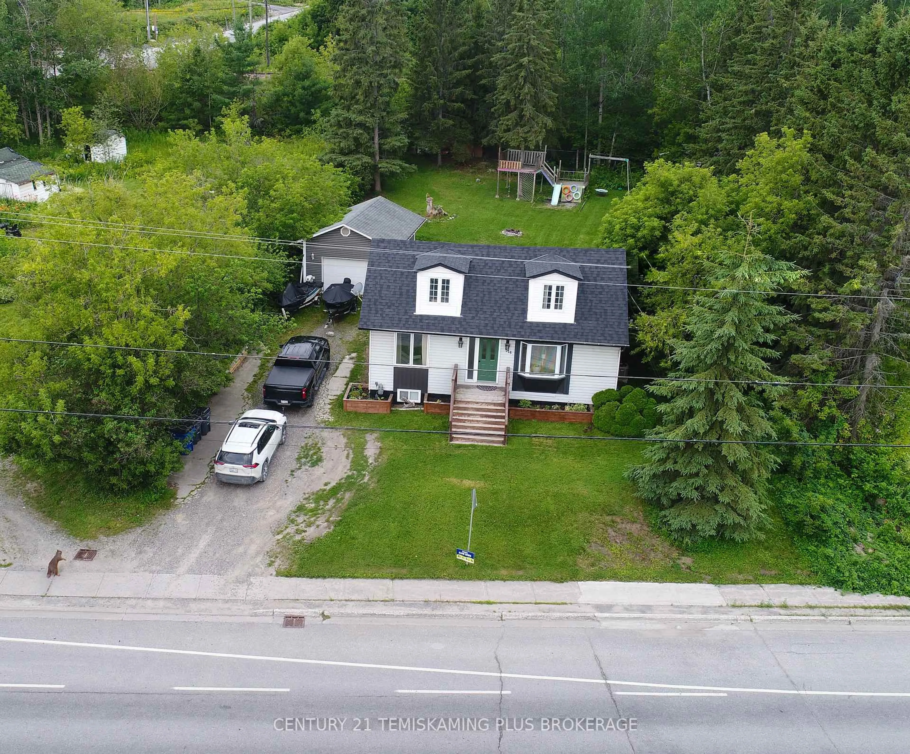 A pic from outside/outdoor area/front of a property/back of a property/a pic from drone, street for 516 Lakeshore Rd, Temiskaming Shores Ontario P0J 1P0