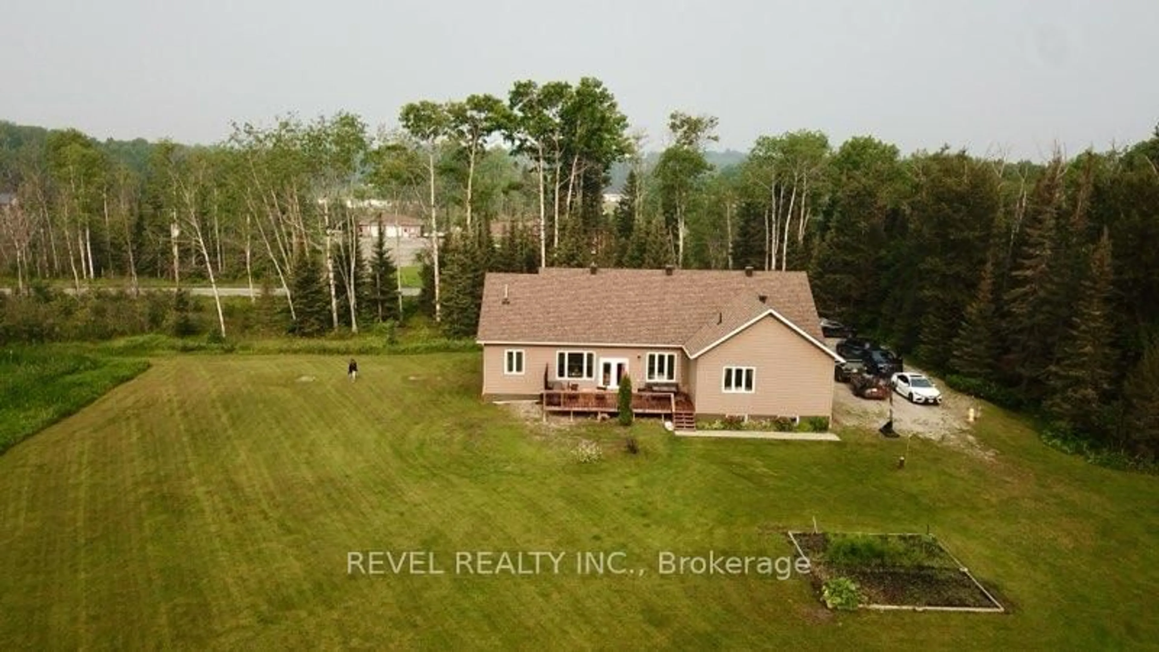 A pic from outside/outdoor area/front of a property/back of a property/a pic from drone, water/lake/river/ocean view for 170 Garden Rd, Timmins Ontario P4R 0B1