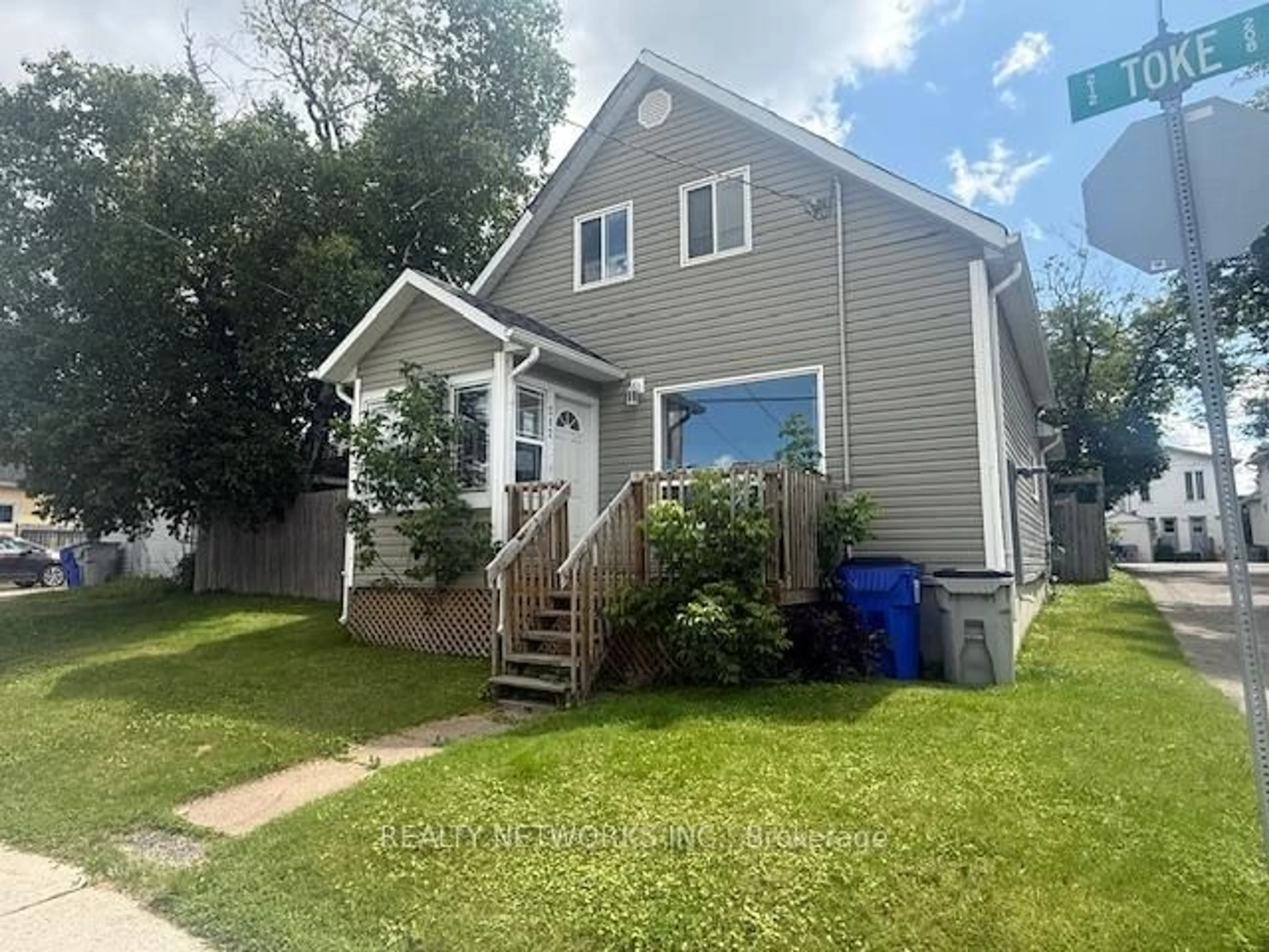 Home with vinyl exterior material, street for 212 Toke St, Timmins Ontario P4N 6V1