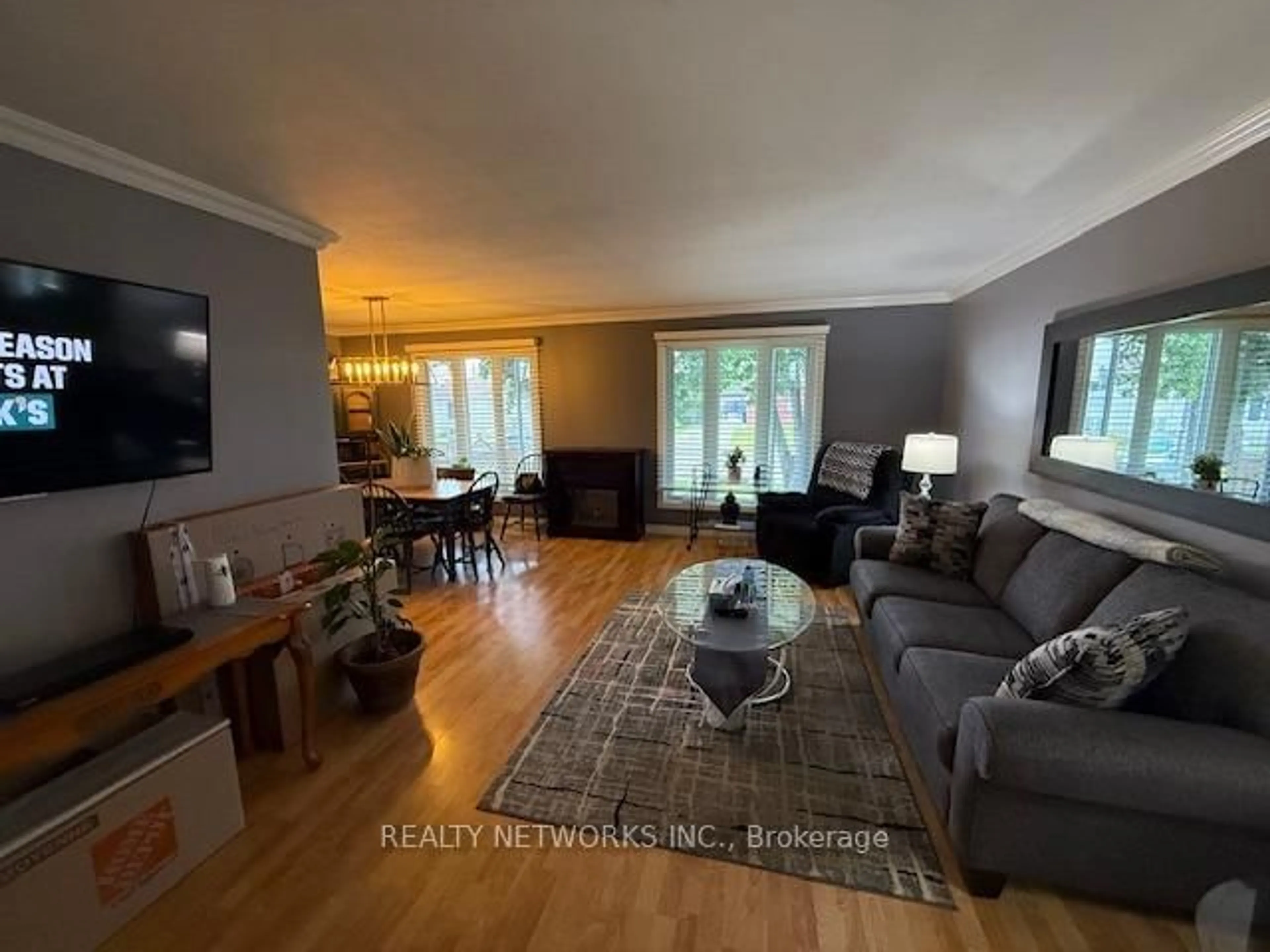 Living room with furniture, wood/laminate floor for 205 Rekela St, Timmins Ontario P0N 1C0