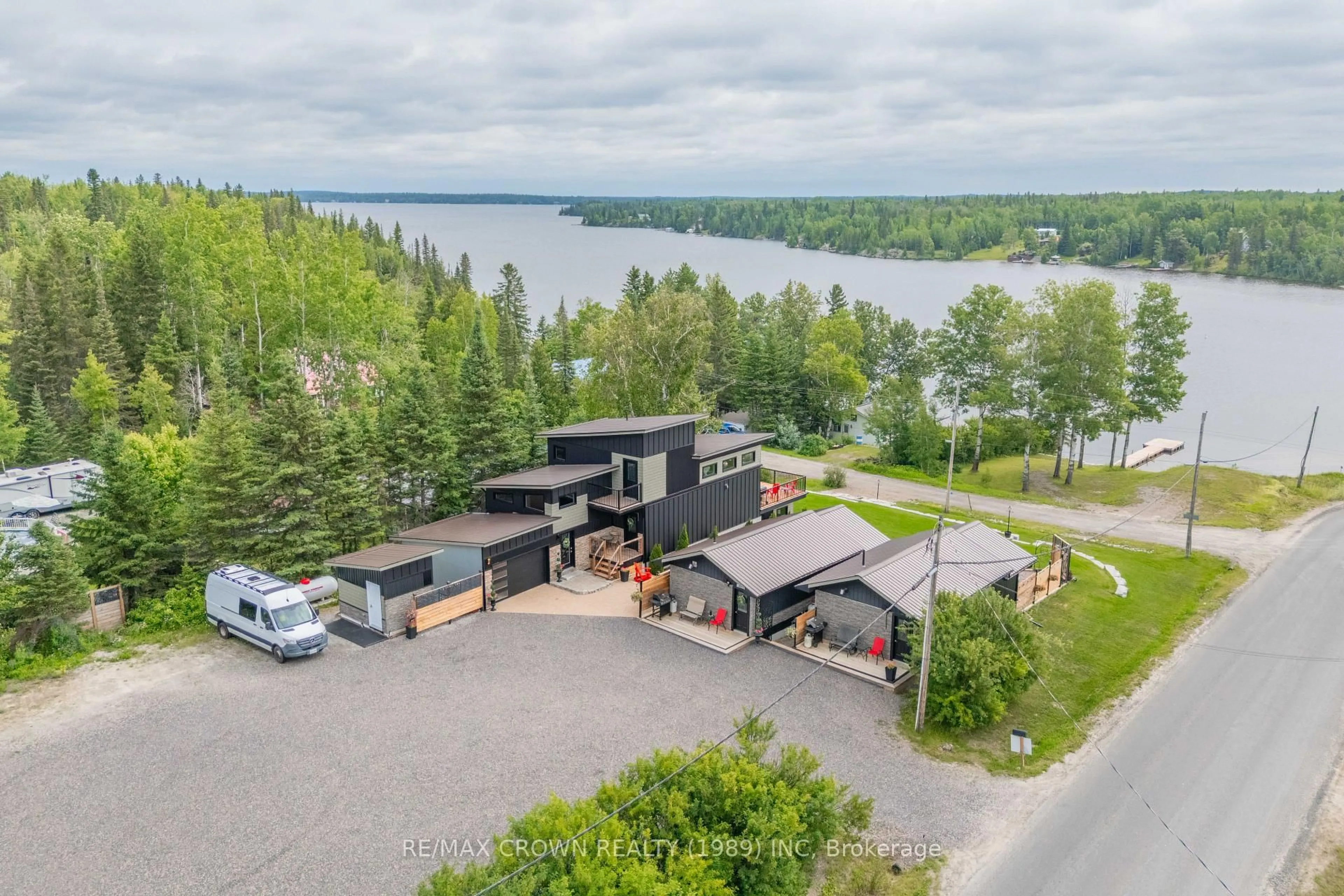 A pic from outside/outdoor area/front of a property/back of a property/a pic from drone, water/lake/river/ocean view for 2 Paterson Rd, Kapuskasing Ontario P0L 1V0