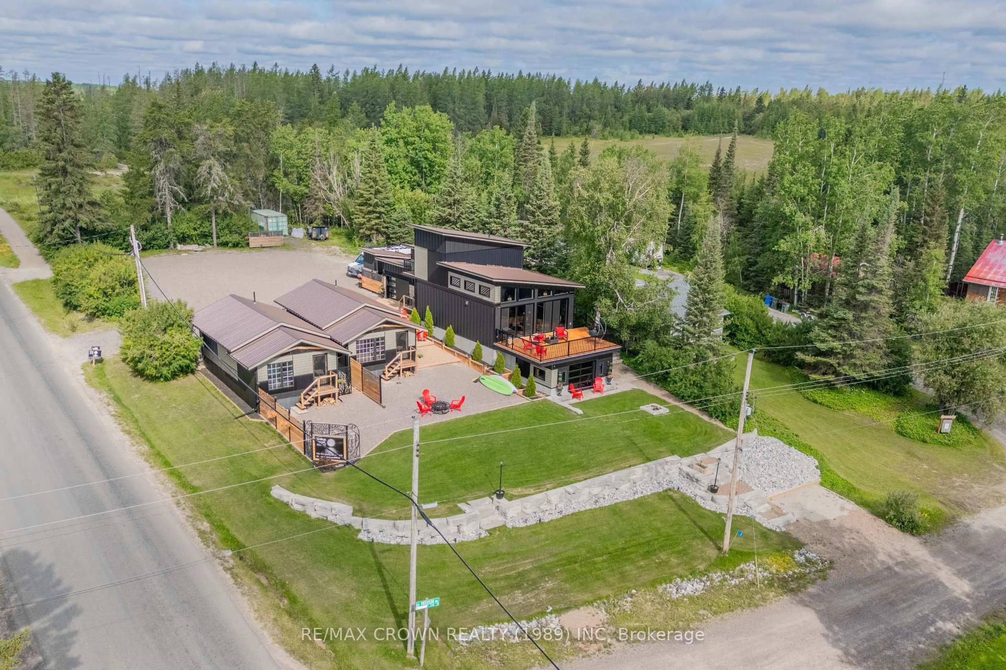 A pic from outside/outdoor area/front of a property/back of a property/a pic from drone, unknown for 2 Paterson Rd, Kapuskasing Ontario P0L 1V0