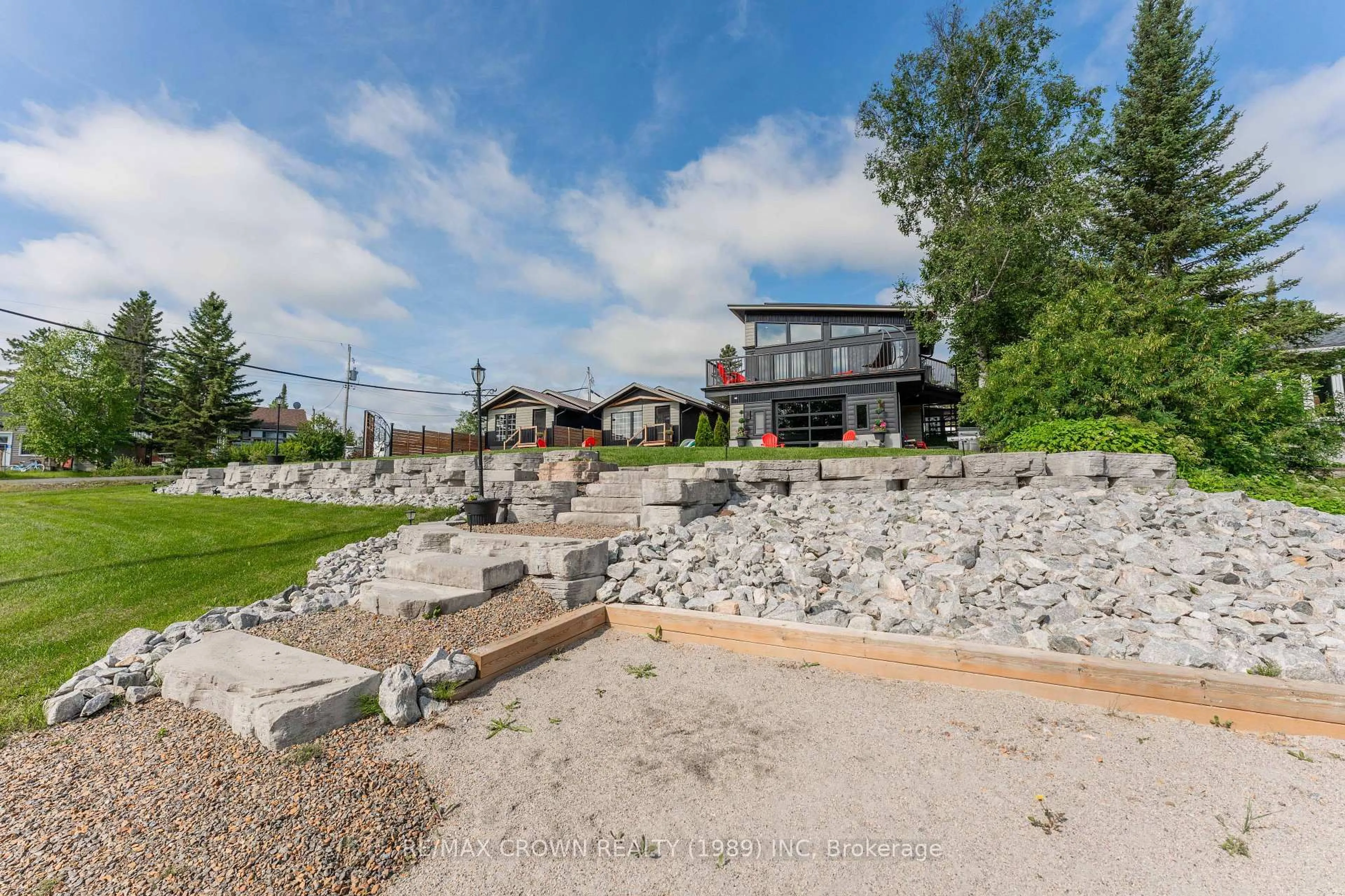 A pic from outside/outdoor area/front of a property/back of a property/a pic from drone, unknown for 2 Paterson Rd, Kapuskasing Ontario P0L 1V0