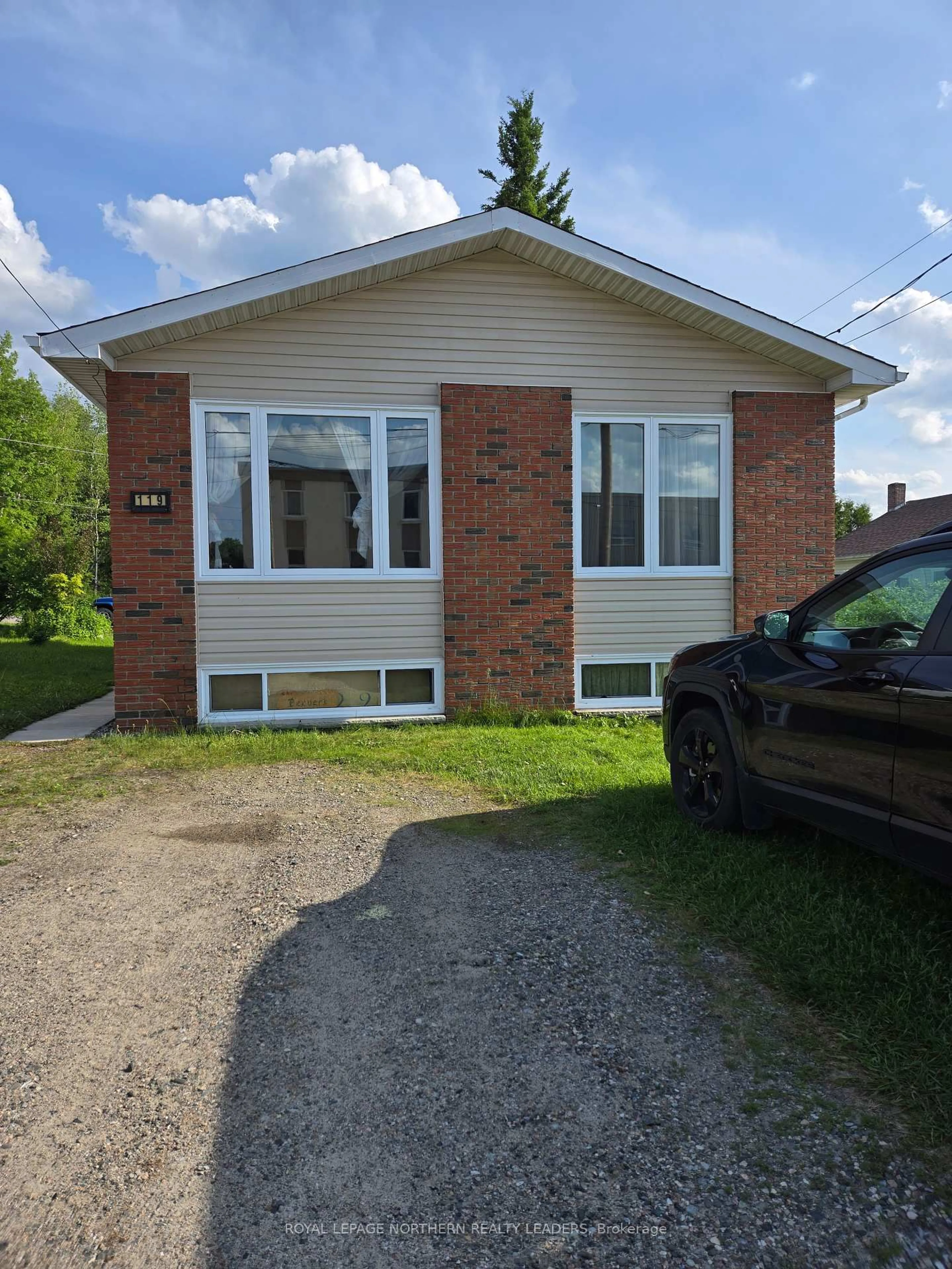 Home with brick exterior material, street for 119 Dixon St, Timmins Ontario P0N 1C0