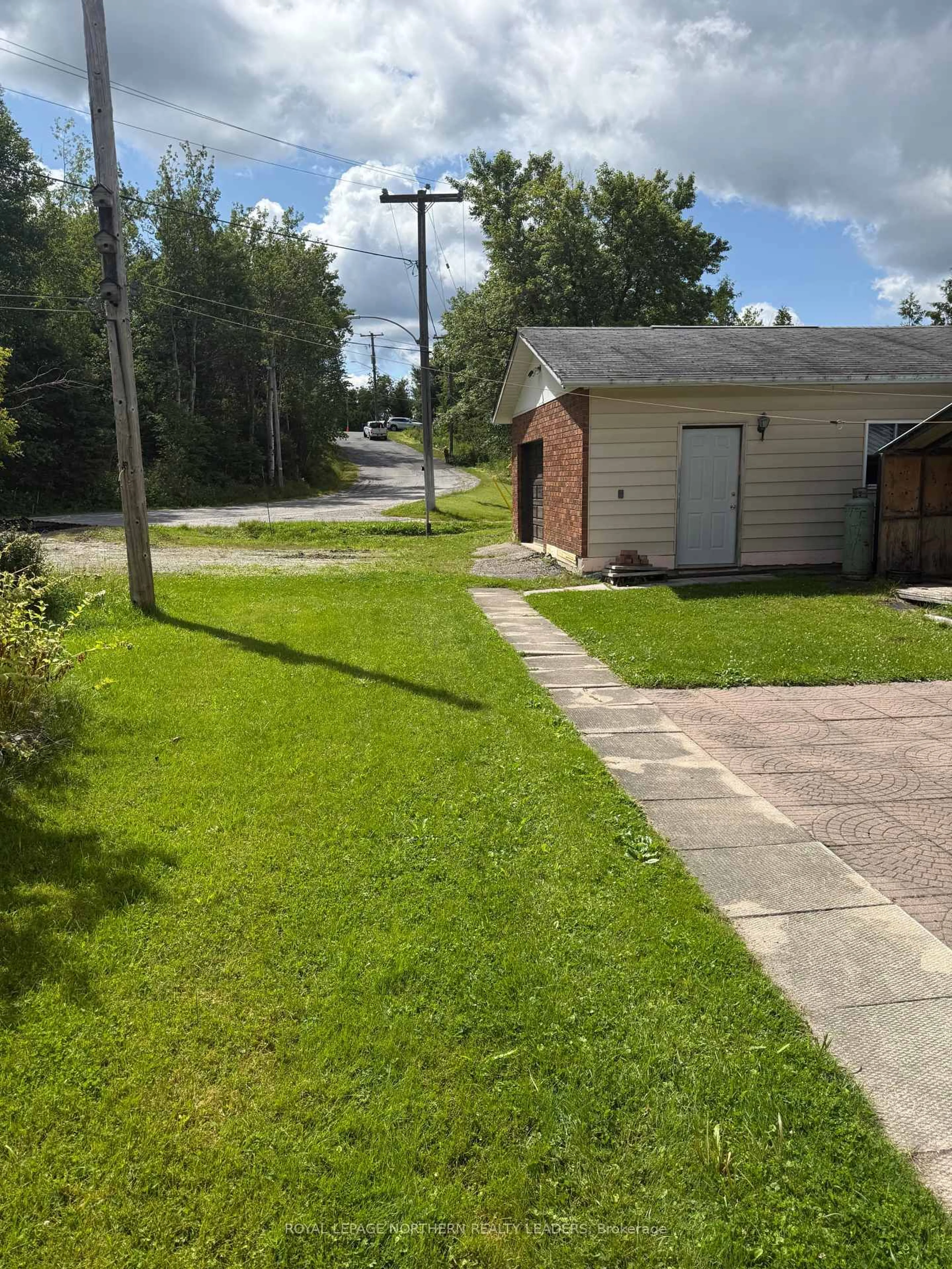 A pic from outside/outdoor area/front of a property/back of a property/a pic from drone, street for 119 Dixon St, Timmins Ontario P0N 1C0