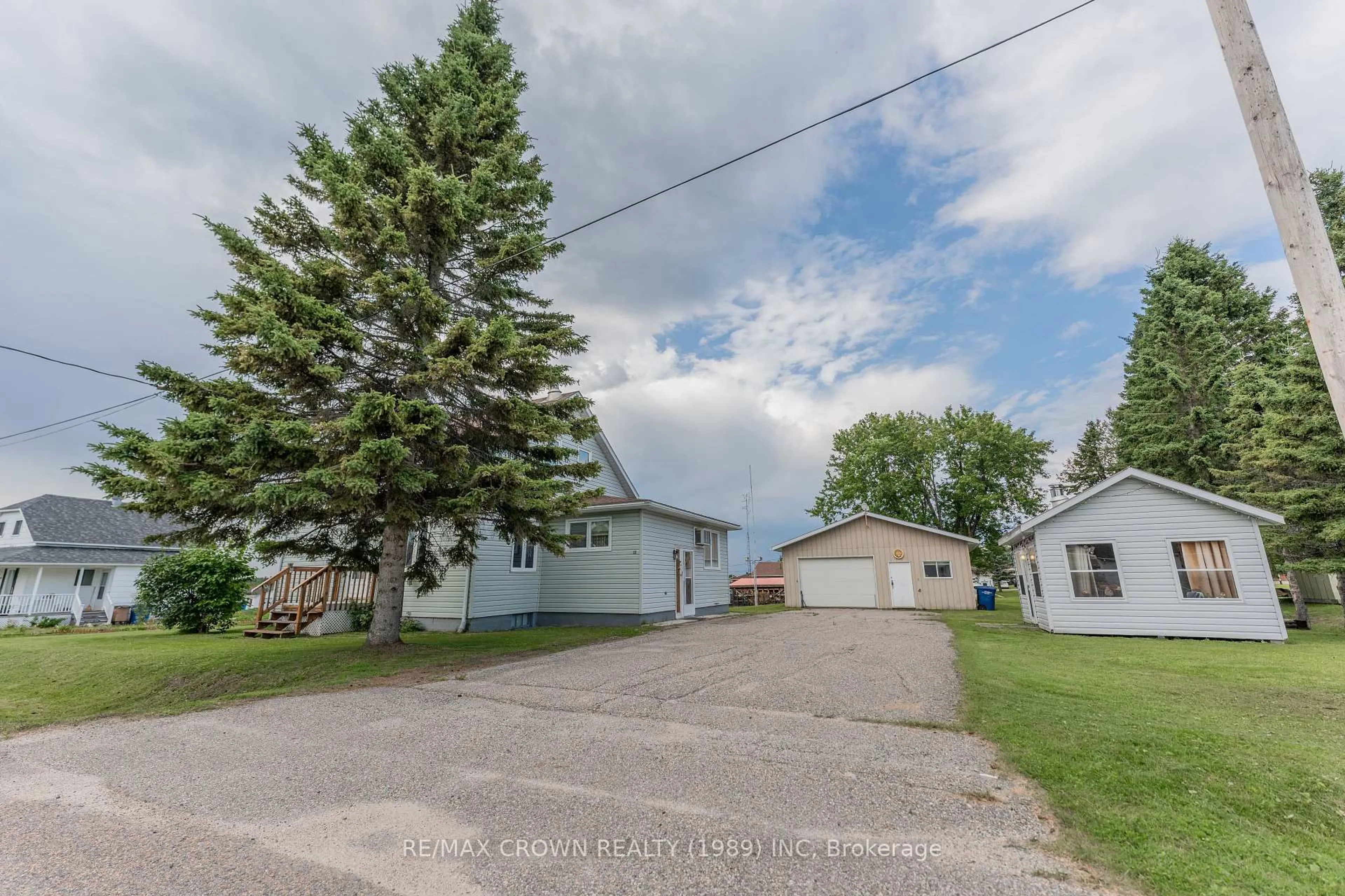 A pic from outside/outdoor area/front of a property/back of a property/a pic from drone, street for 23 Habel St, Kapuskasing Ontario P0L 1G0
