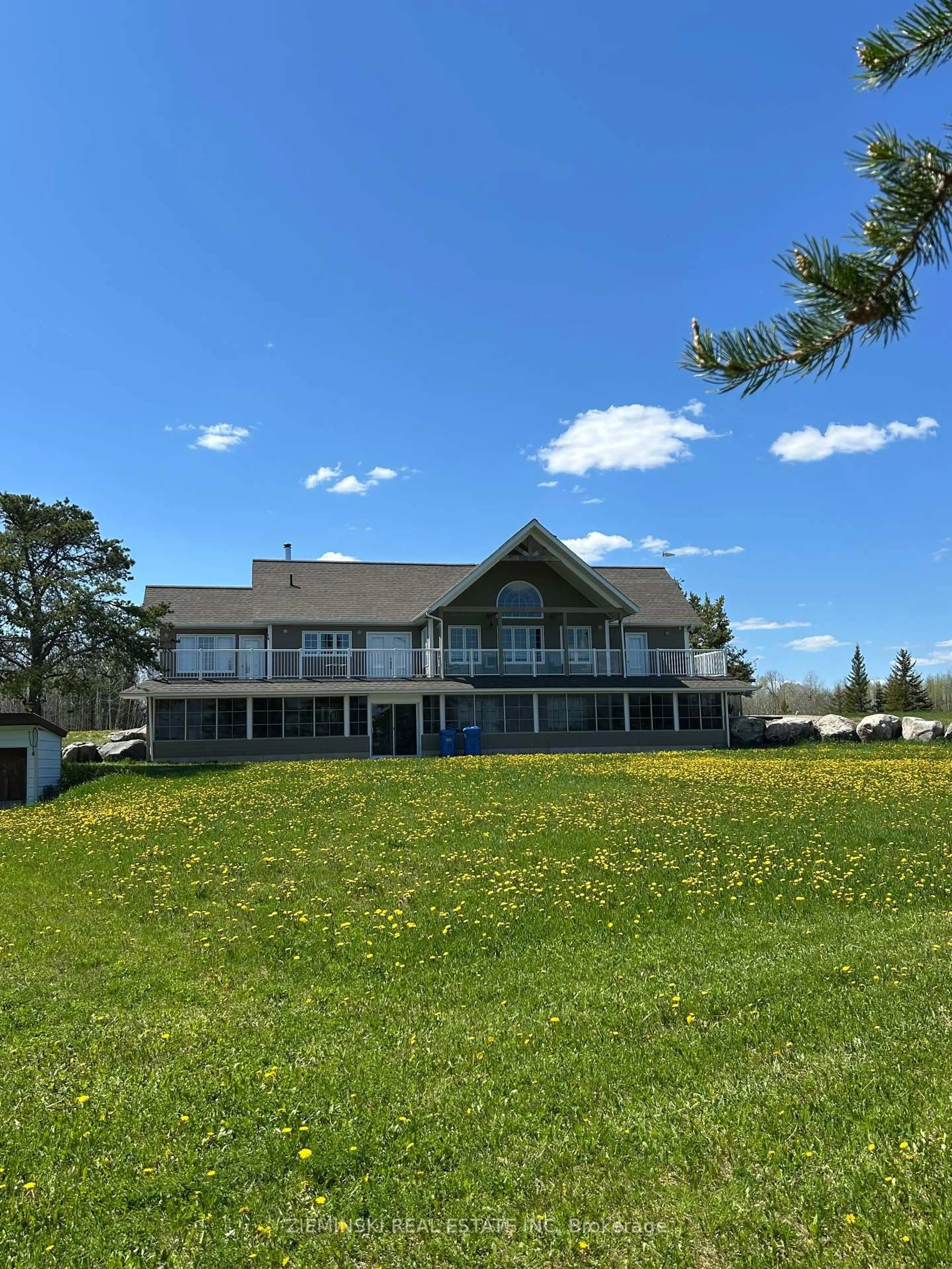 A pic from outside/outdoor area/front of a property/back of a property/a pic from drone, water/lake/river/ocean view for 2099 Camp Bickell Rd, Iroquois Falls Ontario P0K 1G0