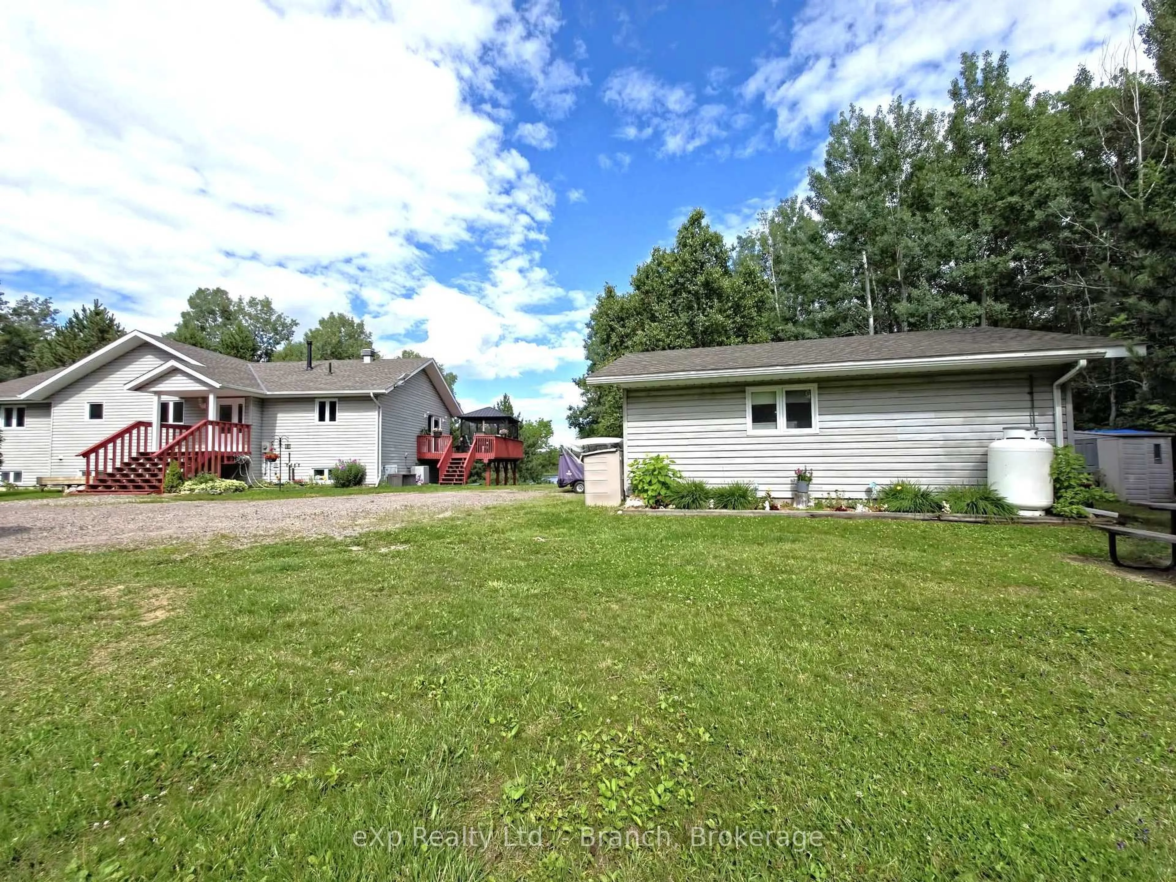 A pic from outside/outdoor area/front of a property/back of a property/a pic from drone, water/lake/river/ocean view for 20 Munroe Cres, Timiskaming Ontario P0M 1H0