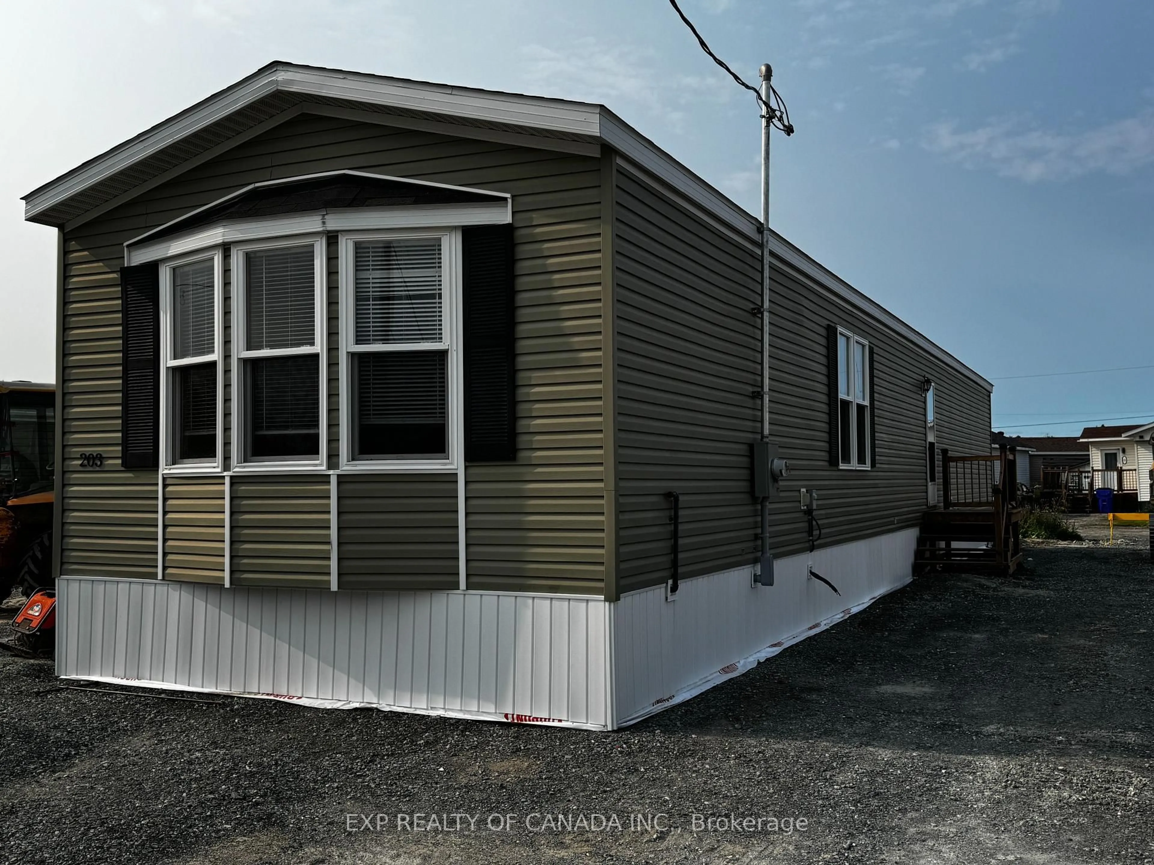 Home with vinyl exterior material, street for 203 Remi Cres, Timmins Ontario P4N 0C5
