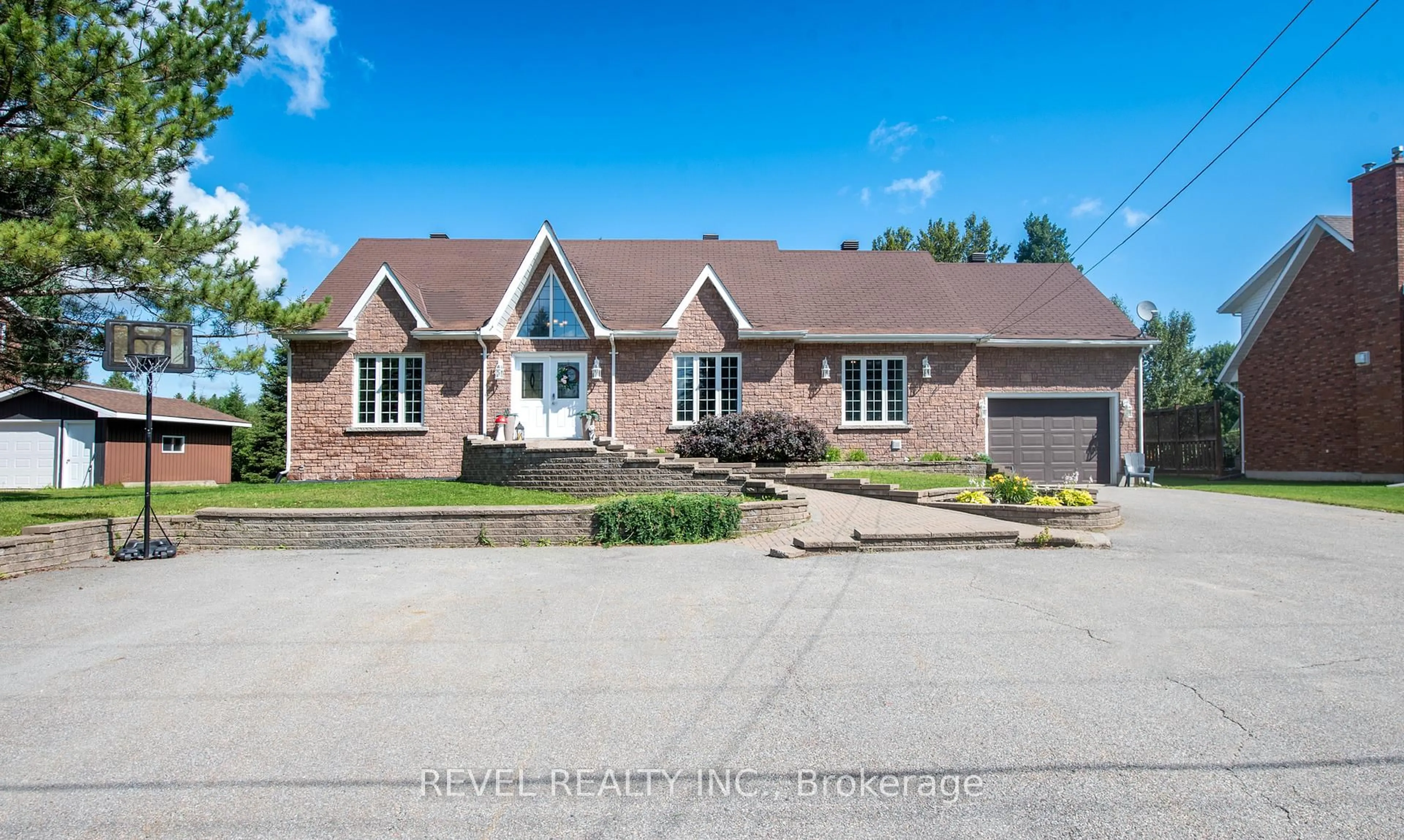 Home with brick exterior material, street for 381 Government Rd, Timmins Ontario P4R 1N4