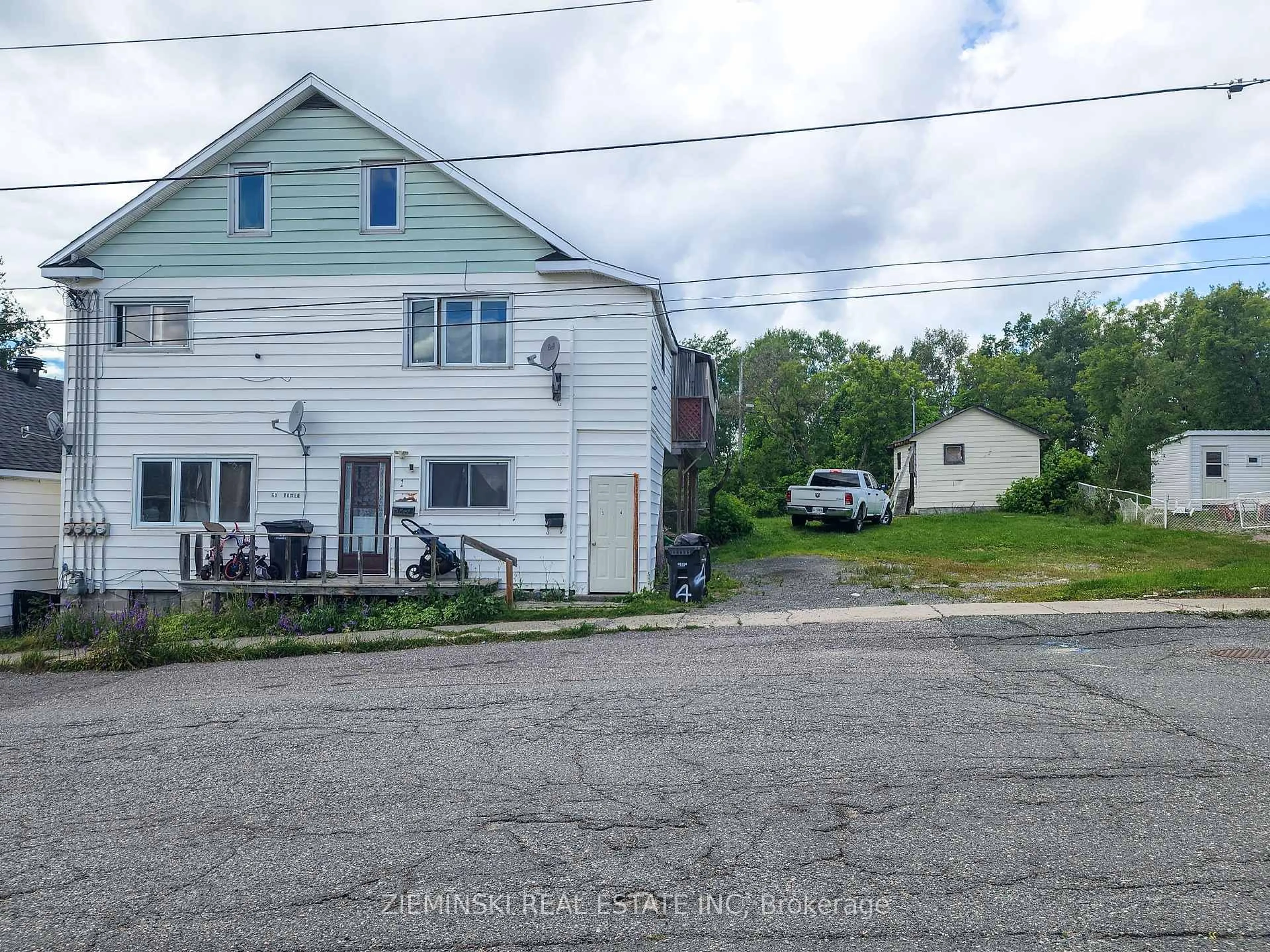 A pic from outside/outdoor area/front of a property/back of a property/a pic from drone, street for 50 And 52 Tower St, Kirkland Lake Ontario P2N 1P2