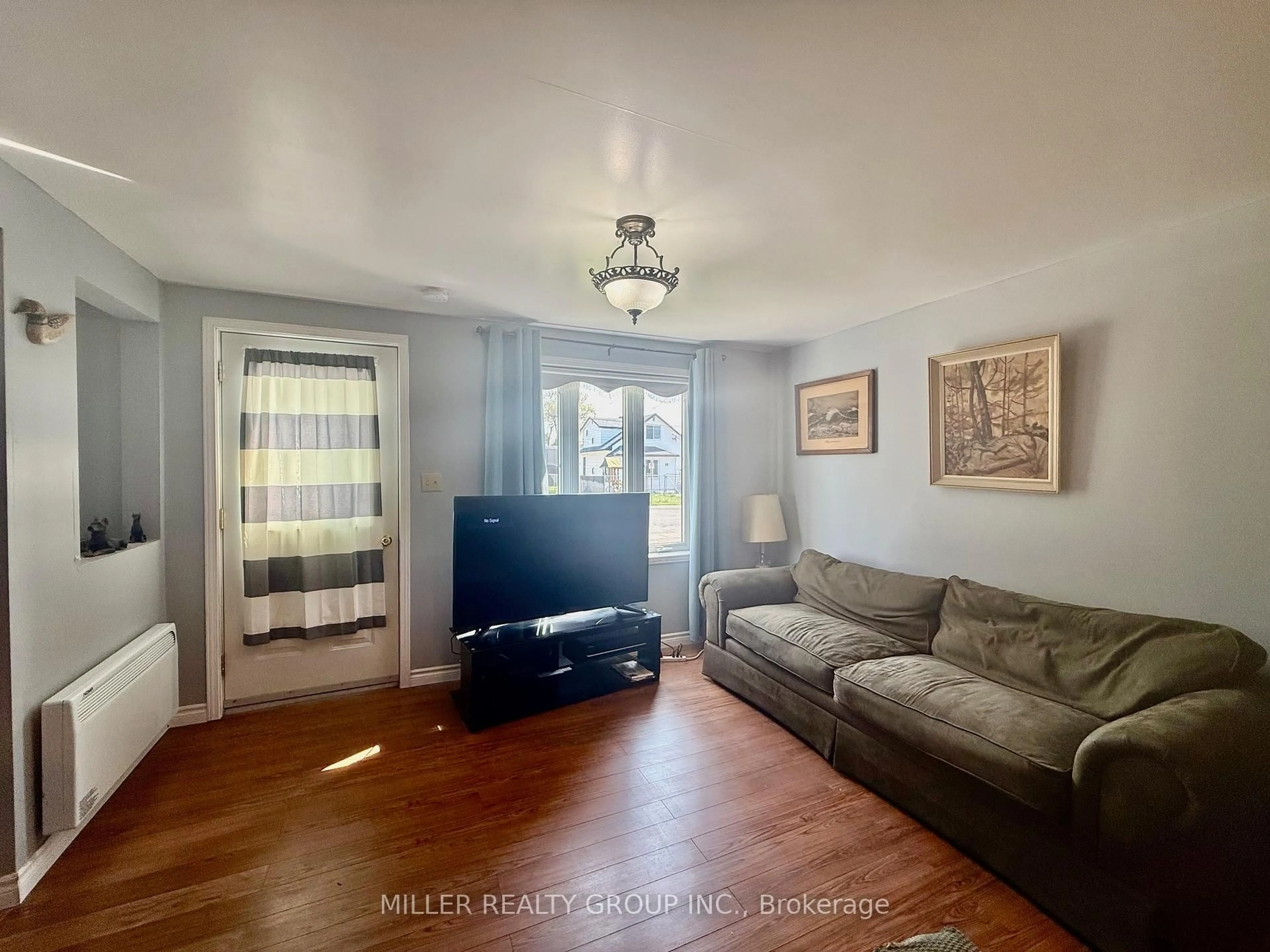 Living room with furniture, unknown for 13 Haliburton Ave, Temiskaming Shores Ontario P0J 1P0