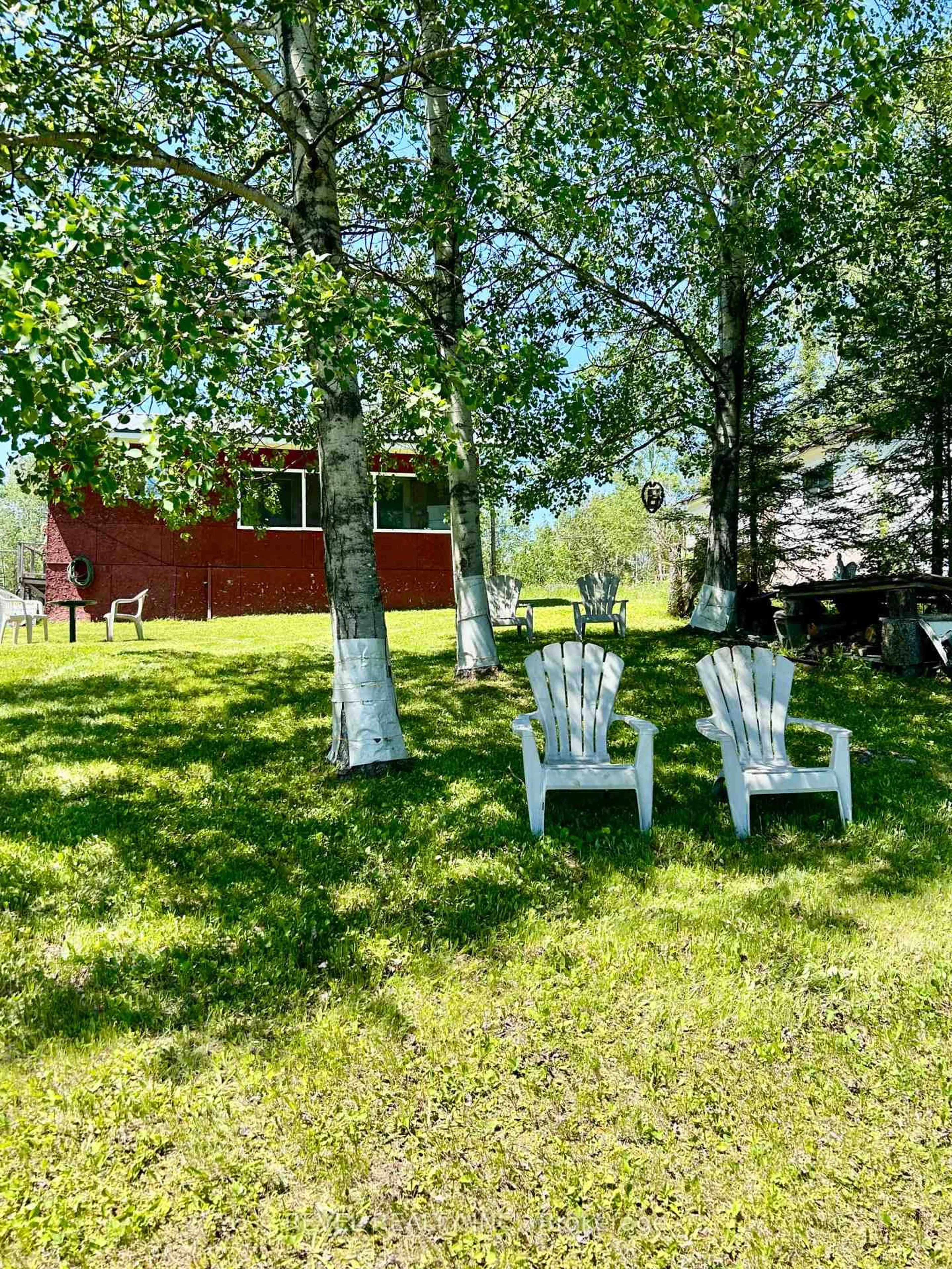 A pic from outside/outdoor area/front of a property/back of a property/a pic from drone, unknown for 801 Lavoie Rd, Kapuskasing Ontario P0L 1G0