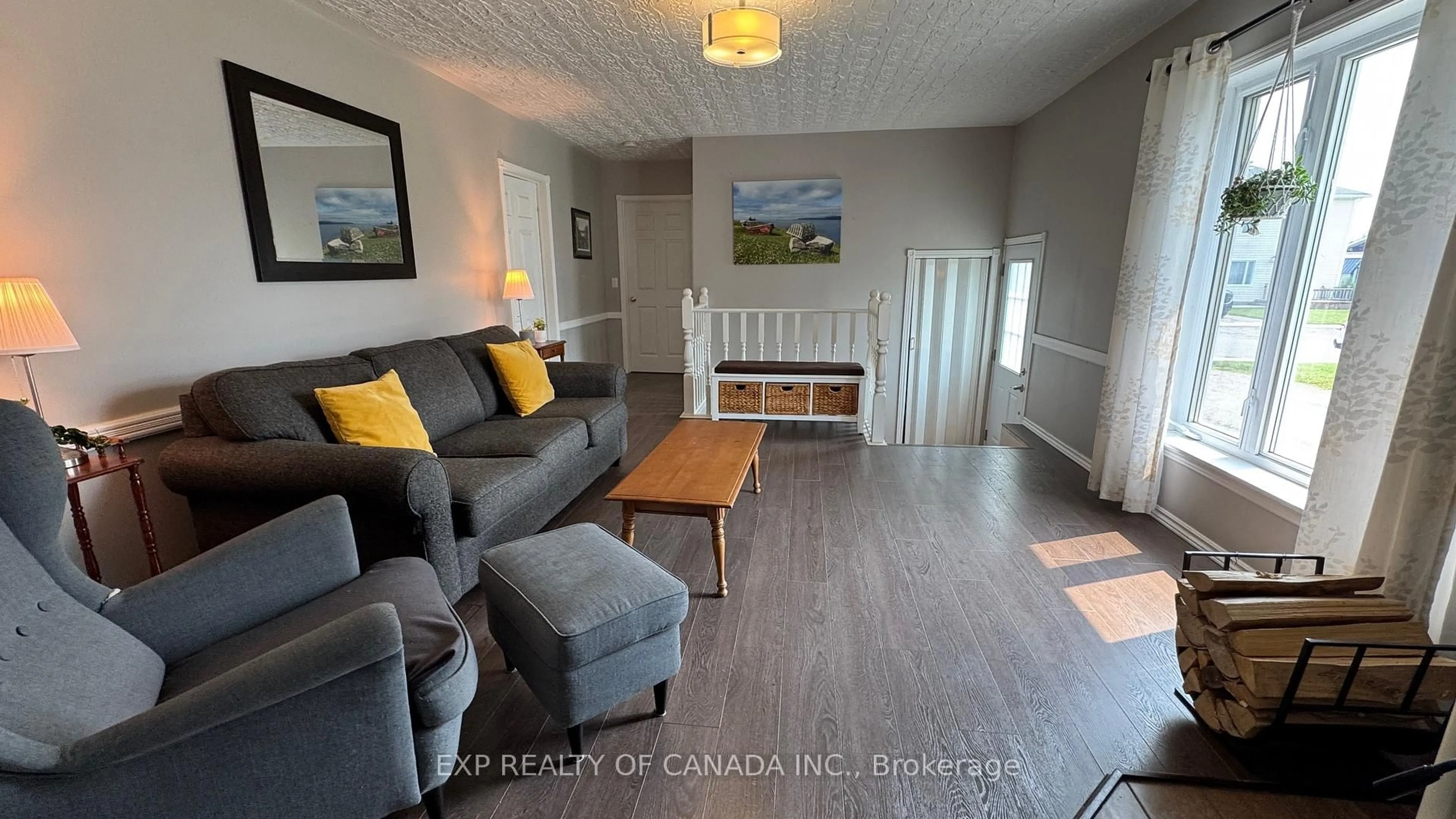 Living room with furniture, wood/laminate floor for 277 Twelfth Ave, Cochrane Ontario P0L 1C0