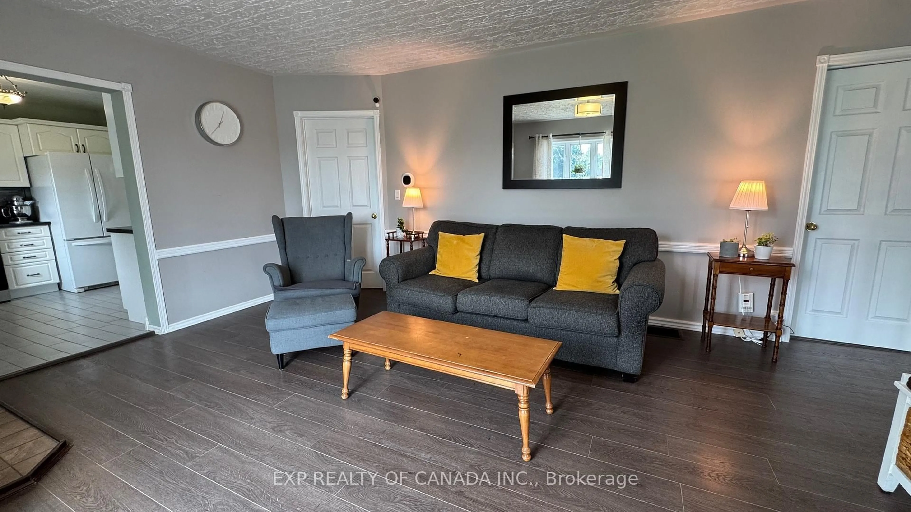 Living room with furniture, wood/laminate floor for 277 Twelfth Ave, Cochrane Ontario P0L 1C0