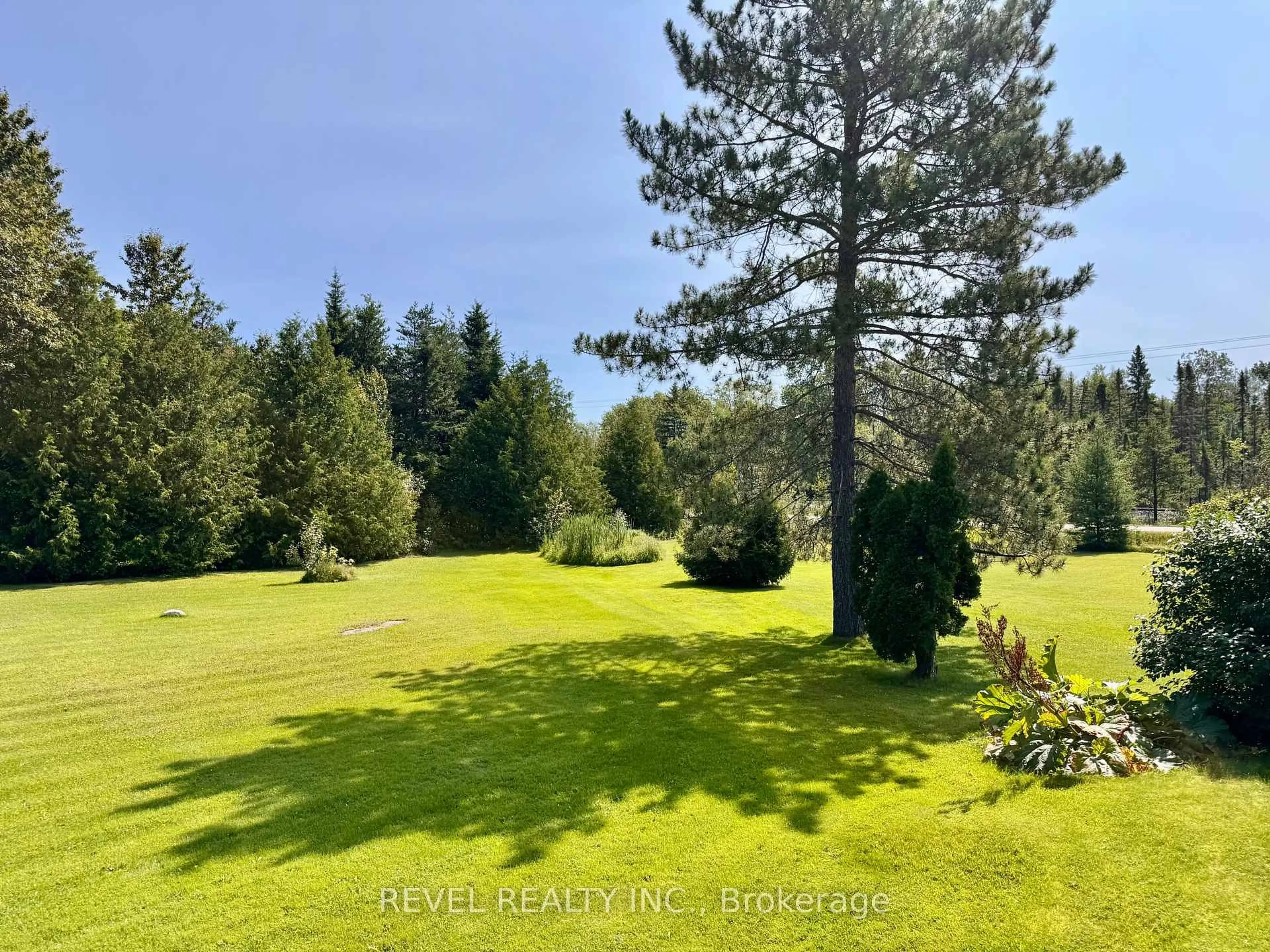 A pic from outside/outdoor area/front of a property/back of a property/a pic from drone, forest/trees view for 1388 Frederick House Lake Rd, Timmins Ontario P0N 1A0