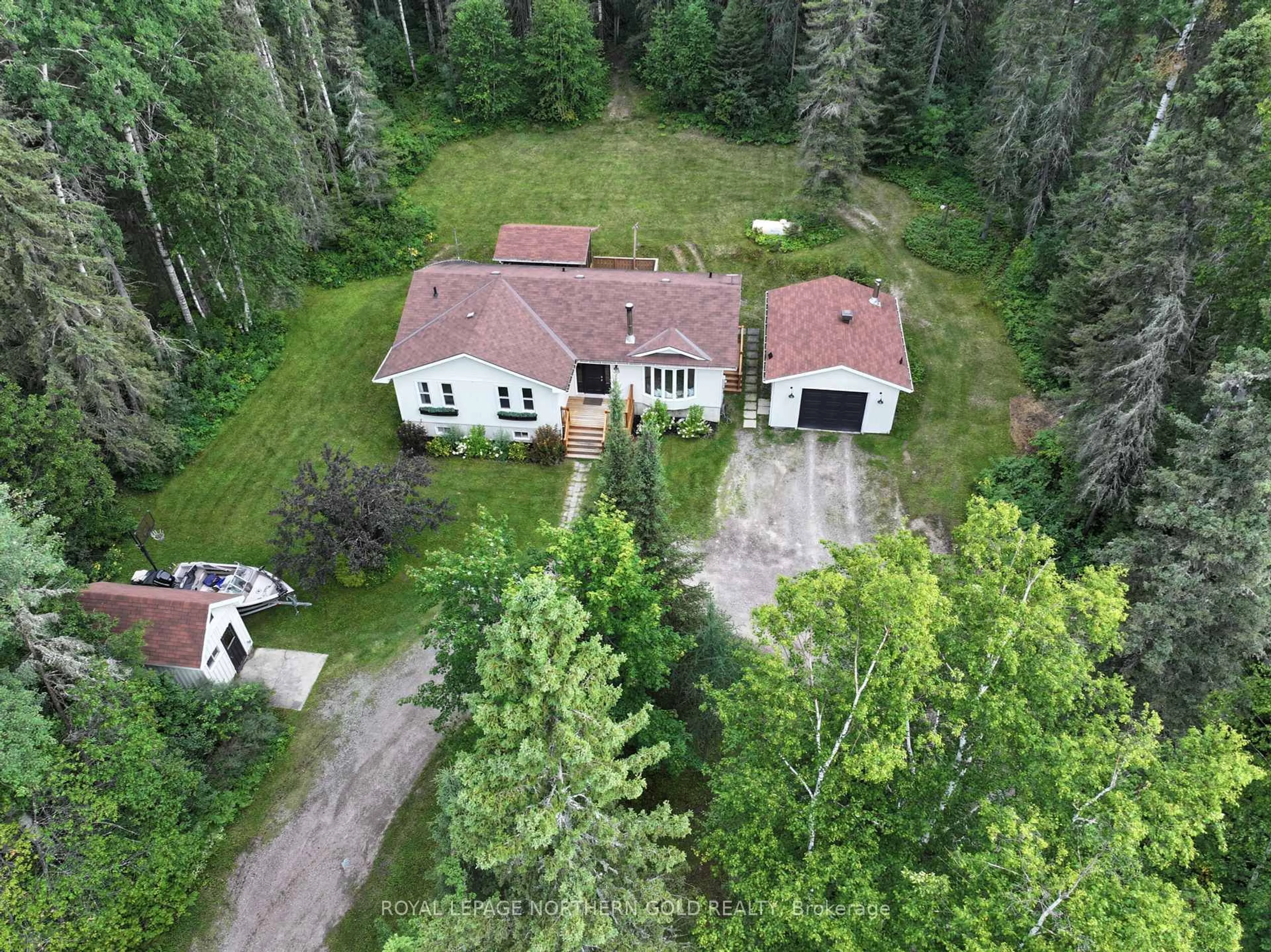 A pic from outside/outdoor area/front of a property/back of a property/a pic from drone, unknown for 38 HARVEY Dr, Kirkland Lake Ontario P2N 3M6