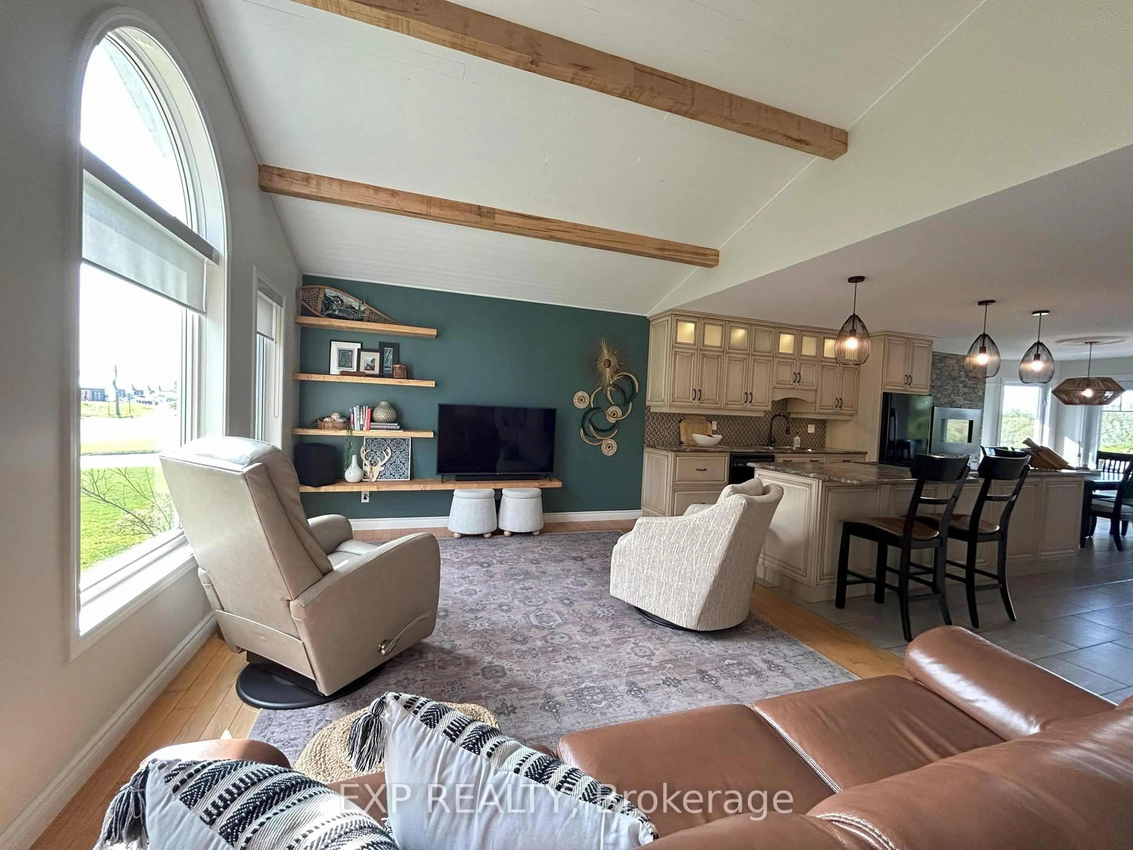 Living room with furniture, wood/laminate floor for 526 Veilleux St, Hearst Ontario P0L 1N0