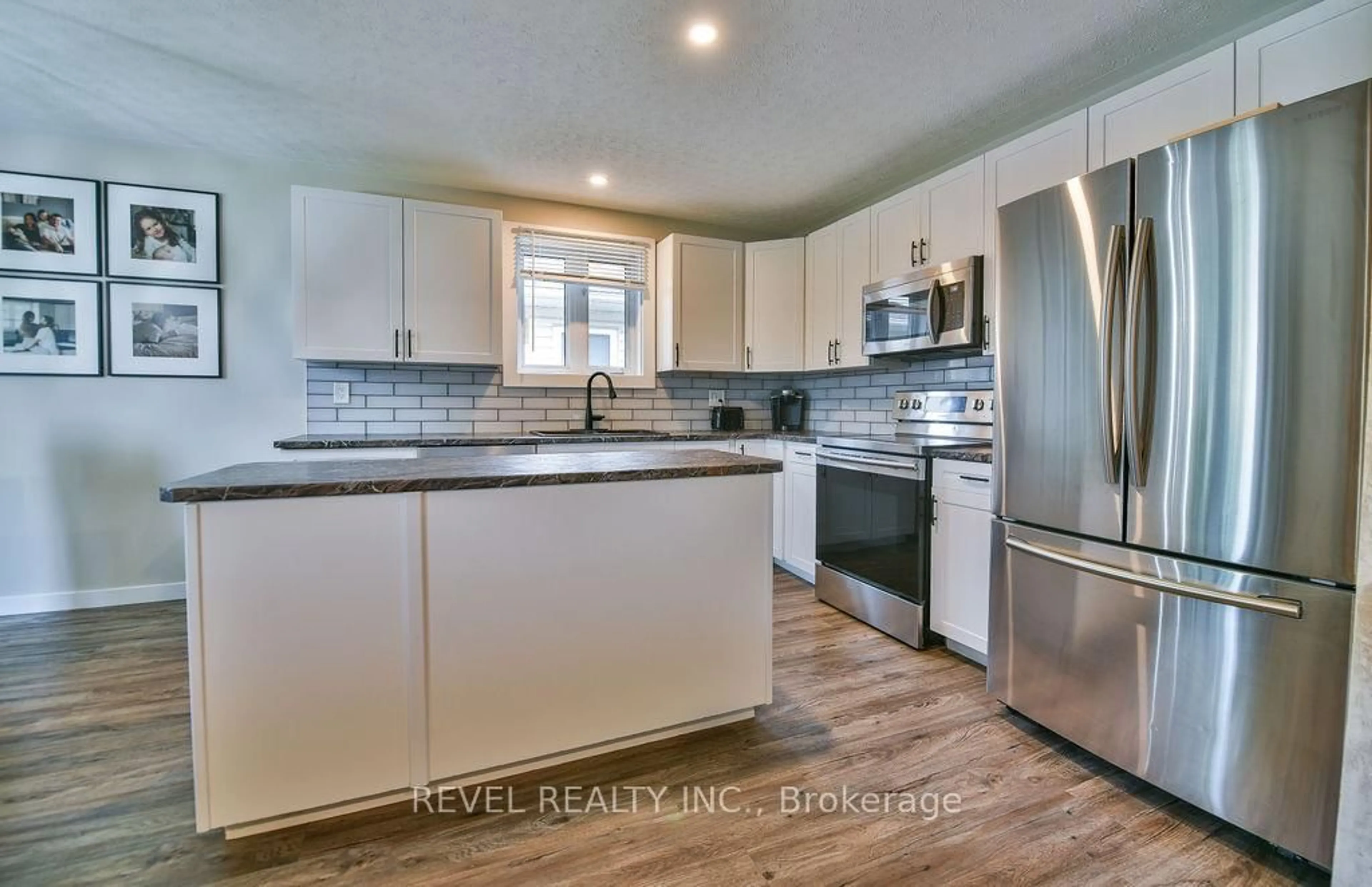 Open concept kitchen, ceramic/tile floor for 146 Philip St, Timmins Ontario P4R 1J4