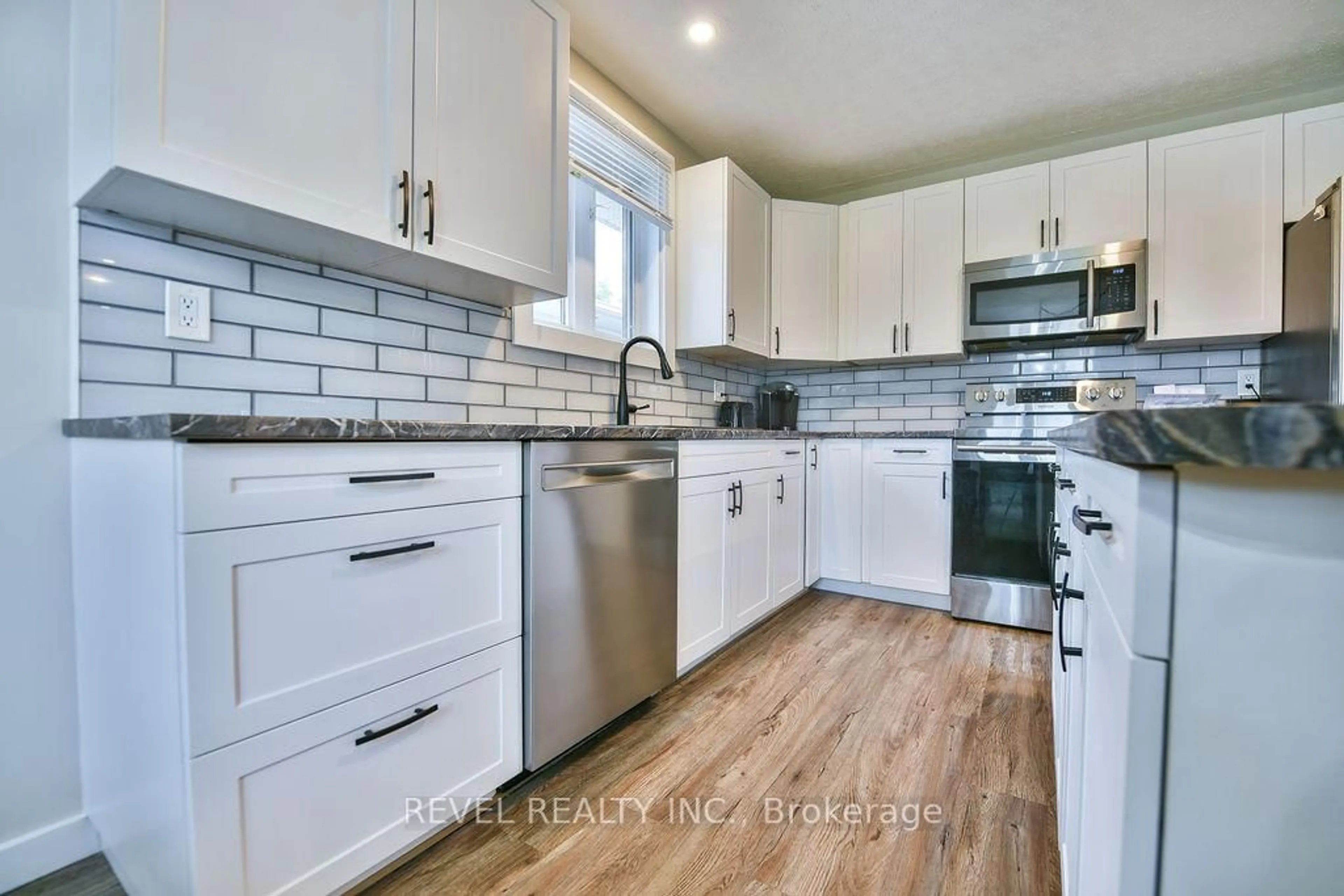 Open concept kitchen, ceramic/tile floor for 146 Philip St, Timmins Ontario P4R 1J4