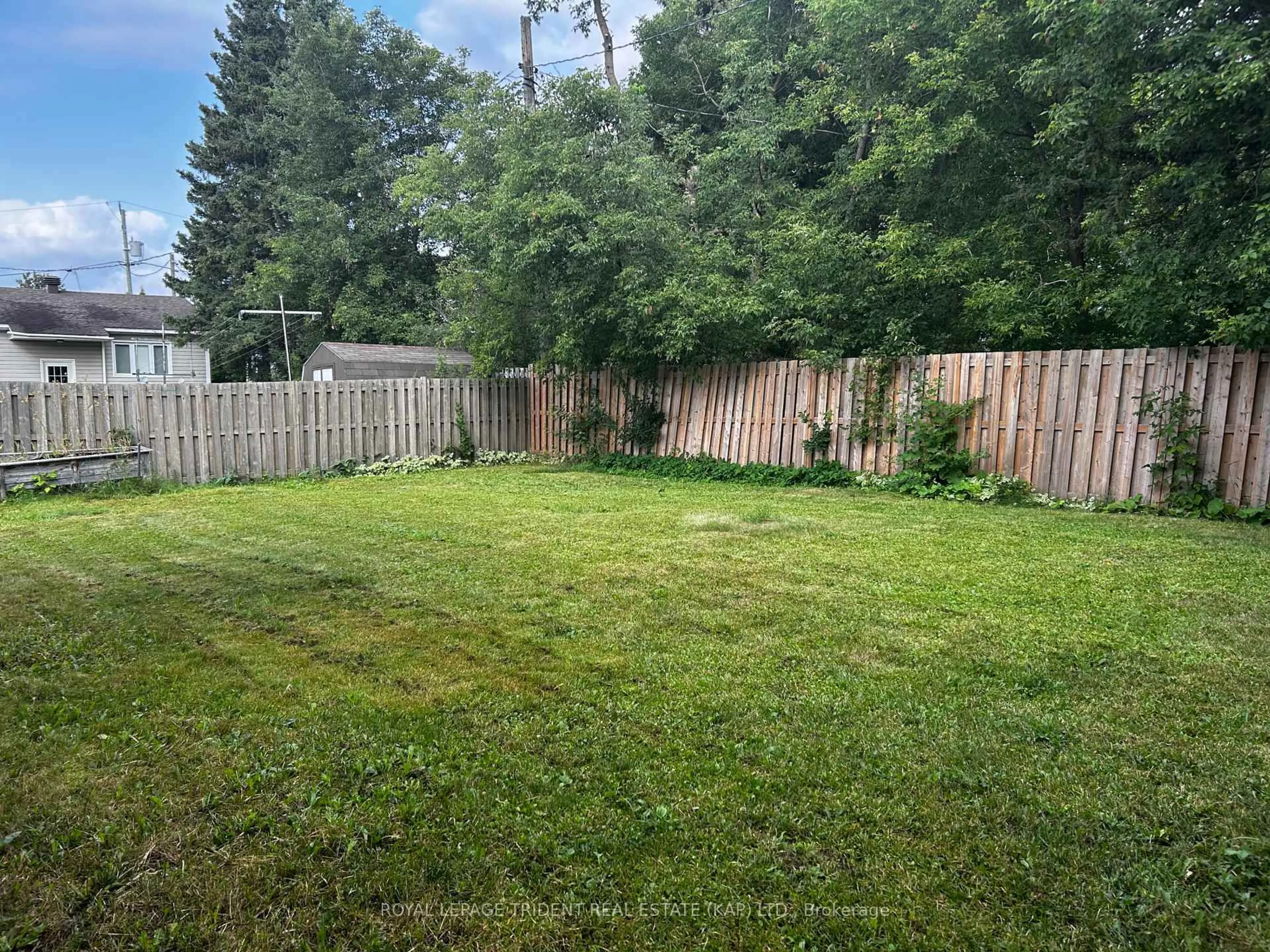 A pic from outside/outdoor area/front of a property/back of a property/a pic from drone, forest/trees view for 14 Niagara St, Kapuskasing Ontario P5N 2B8