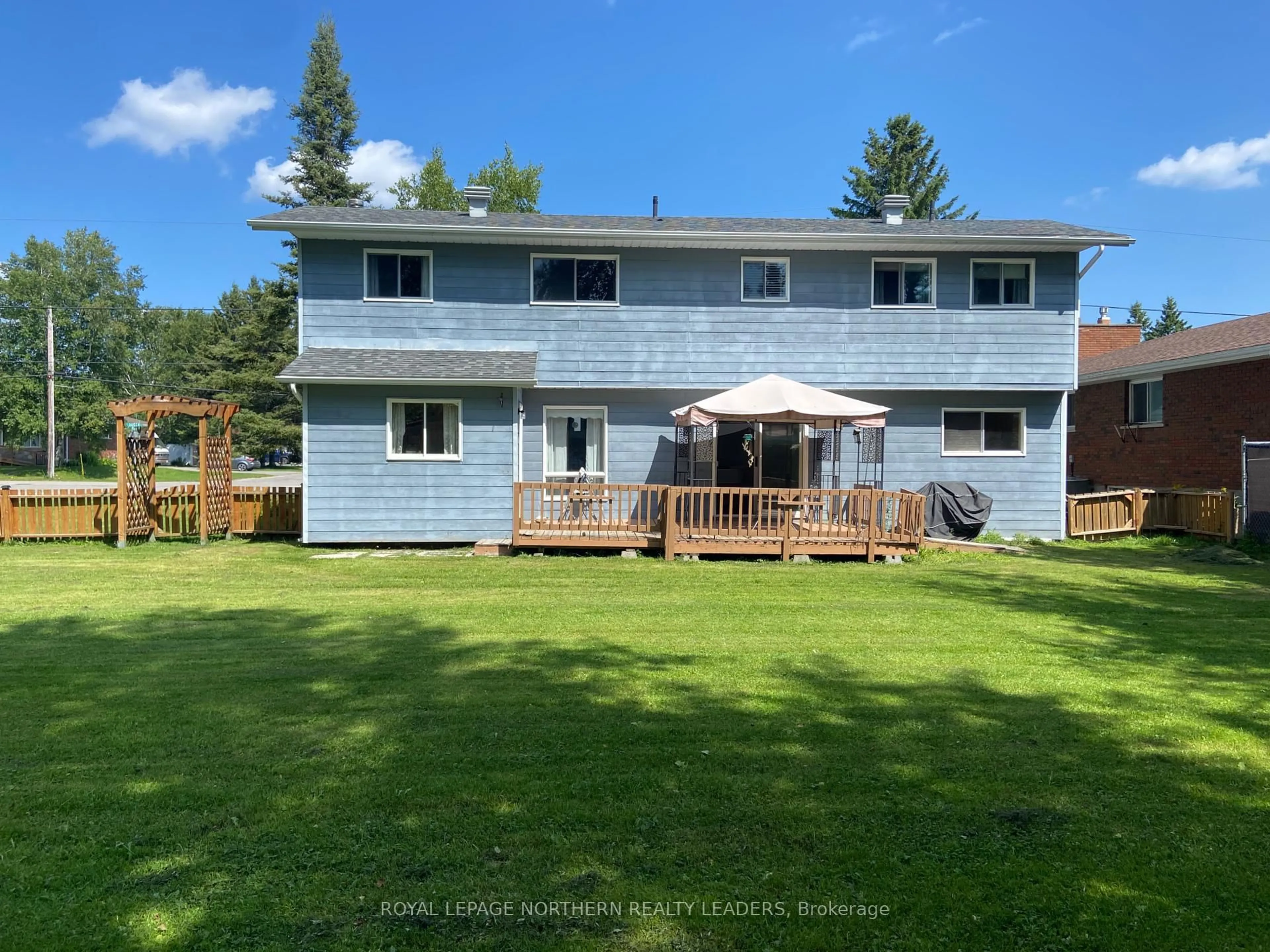 A pic from outside/outdoor area/front of a property/back of a property/a pic from drone, water/lake/river/ocean view for 501 Queen St, Timmins Ontario P0N 1C0