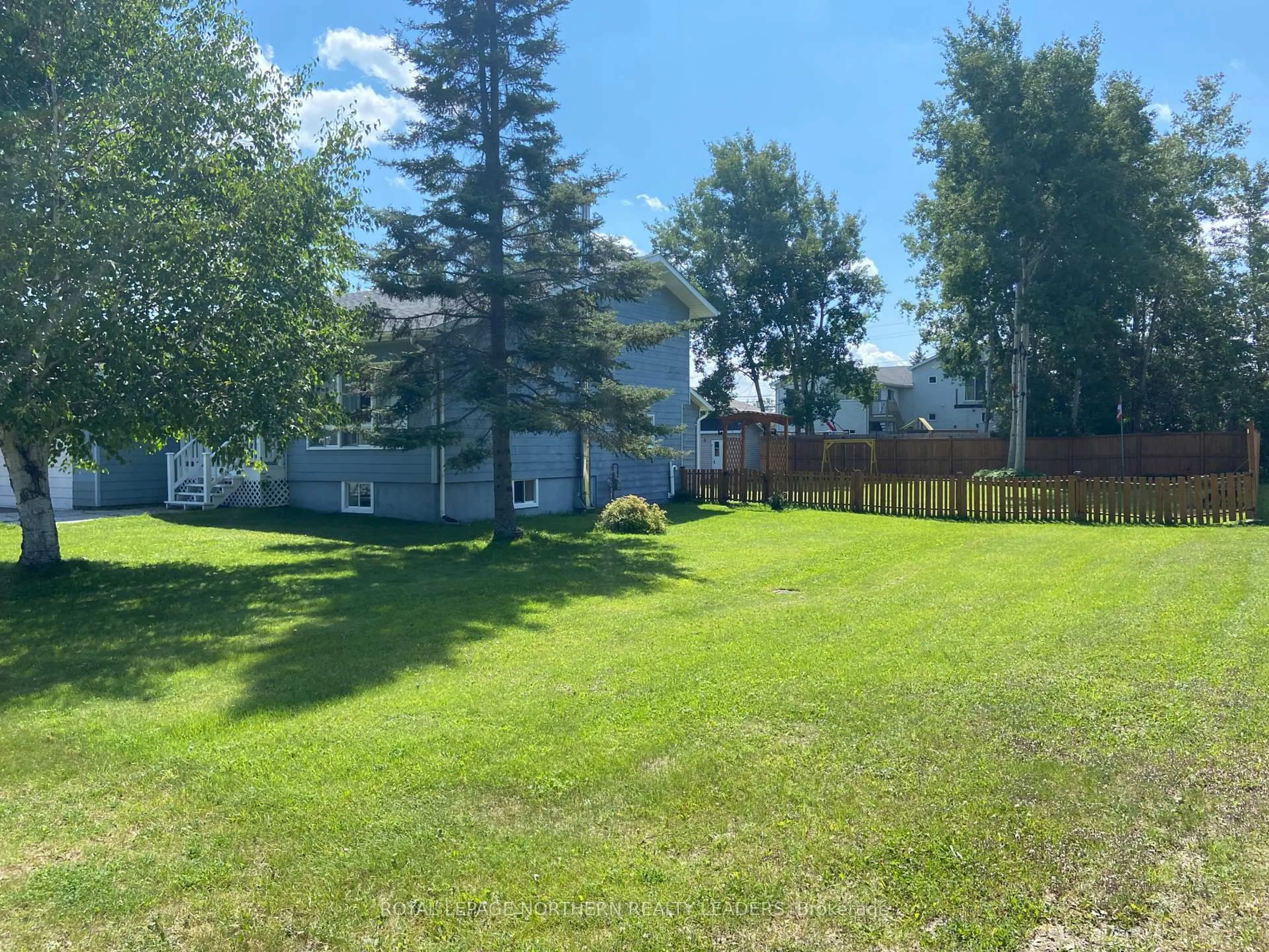 A pic from outside/outdoor area/front of a property/back of a property/a pic from drone, water/lake/river/ocean view for 501 Queen St, Timmins Ontario P0N 1C0