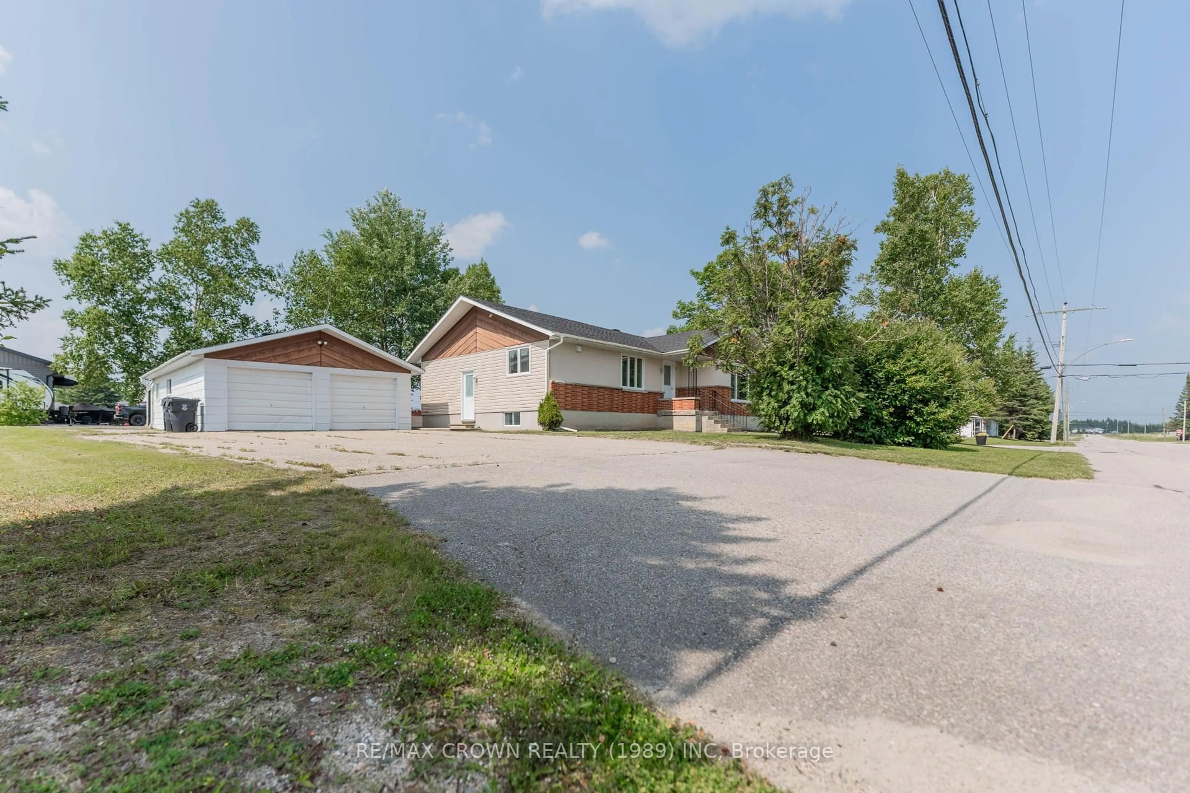 A pic from outside/outdoor area/front of a property/back of a property/a pic from drone, street for 7 De L'Eglise Ave, Kapuskasing Ontario P0L 2G0
