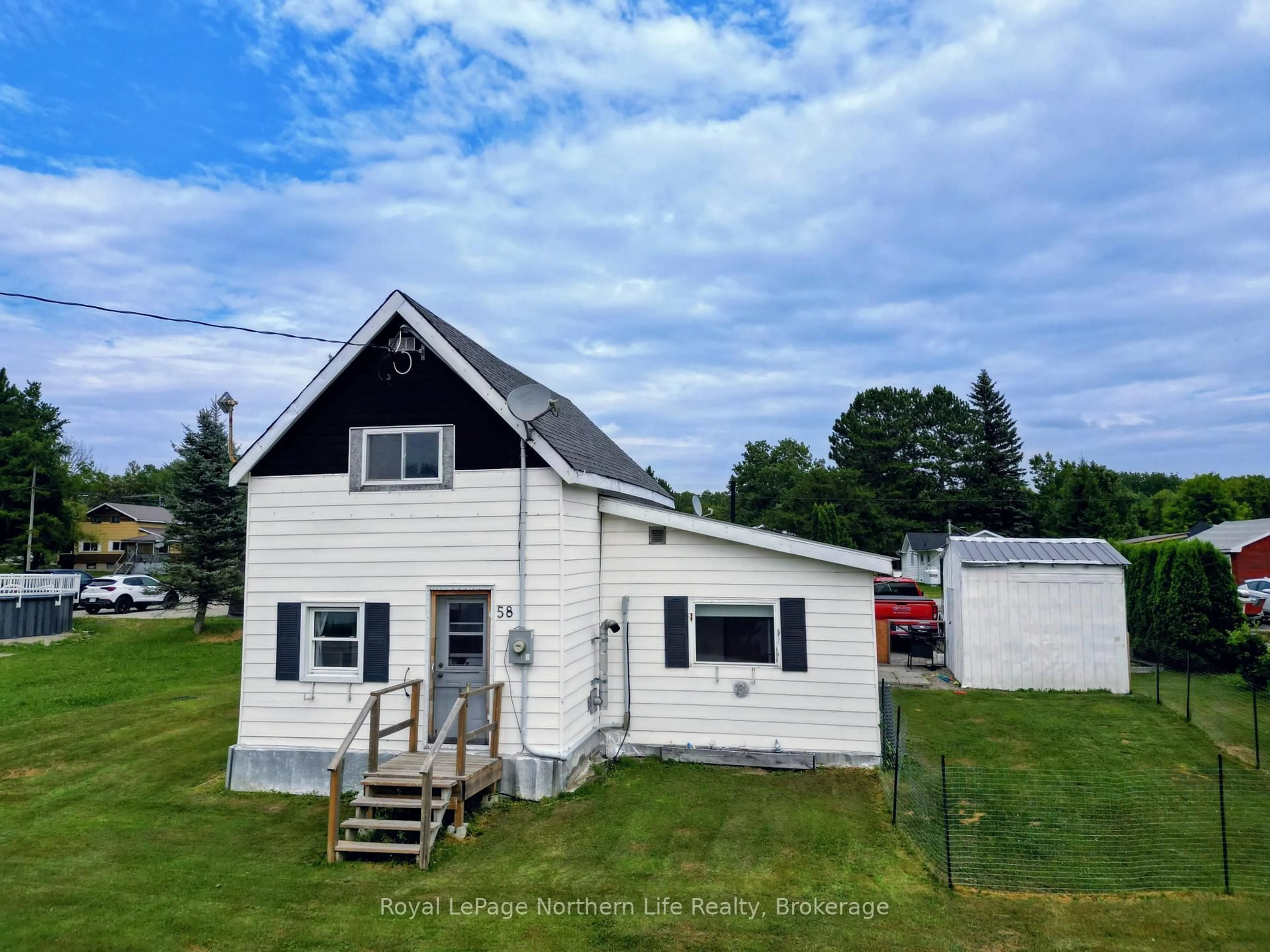 A pic from outside/outdoor area/front of a property/back of a property/a pic from drone, building for 58 Main St, Timiskaming Ontario P0J 1N0