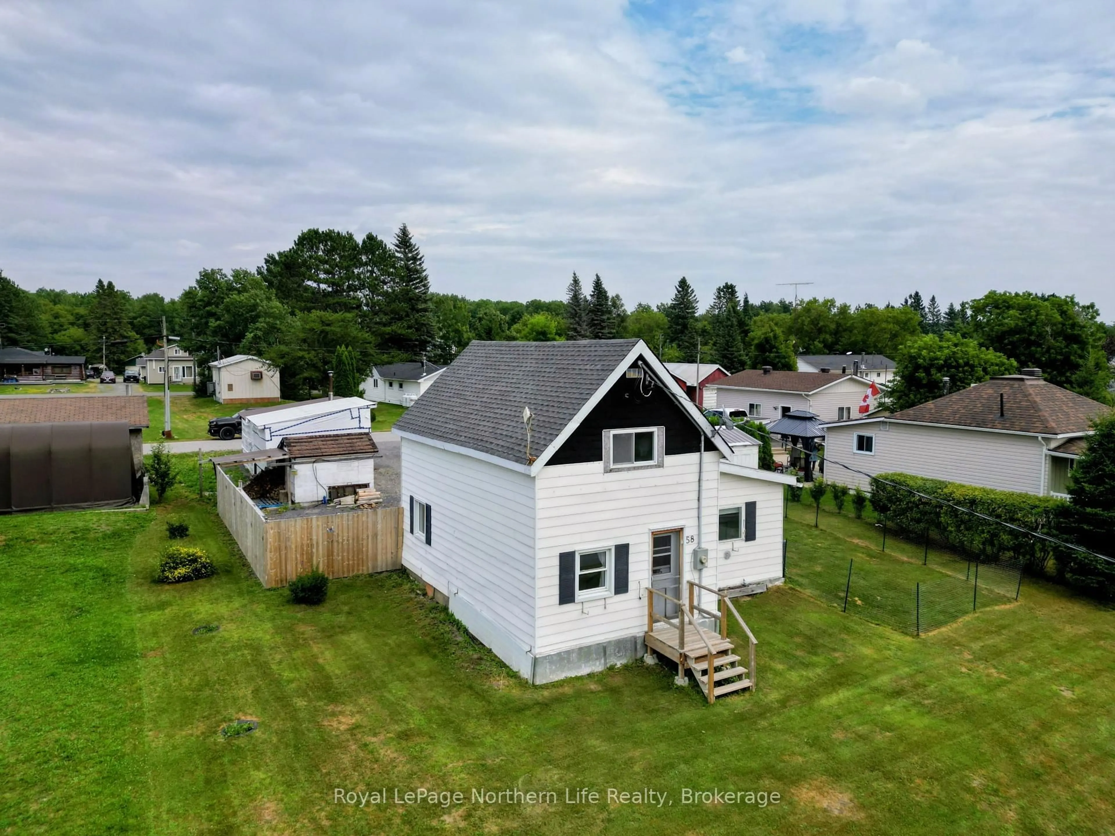 A pic from outside/outdoor area/front of a property/back of a property/a pic from drone, unknown for 58 Main St, Timiskaming Ontario P0J 1N0