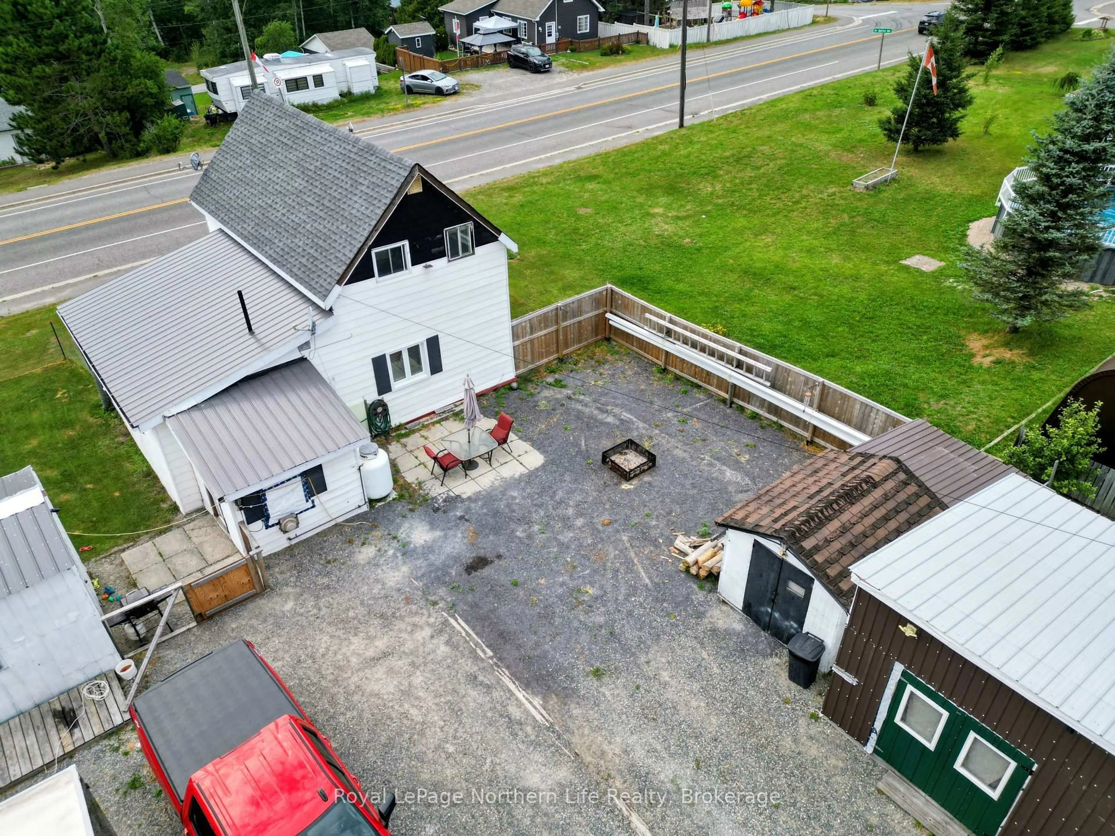 A pic from outside/outdoor area/front of a property/back of a property/a pic from drone, street for 58 Main St, Timiskaming Ontario P0J 1N0
