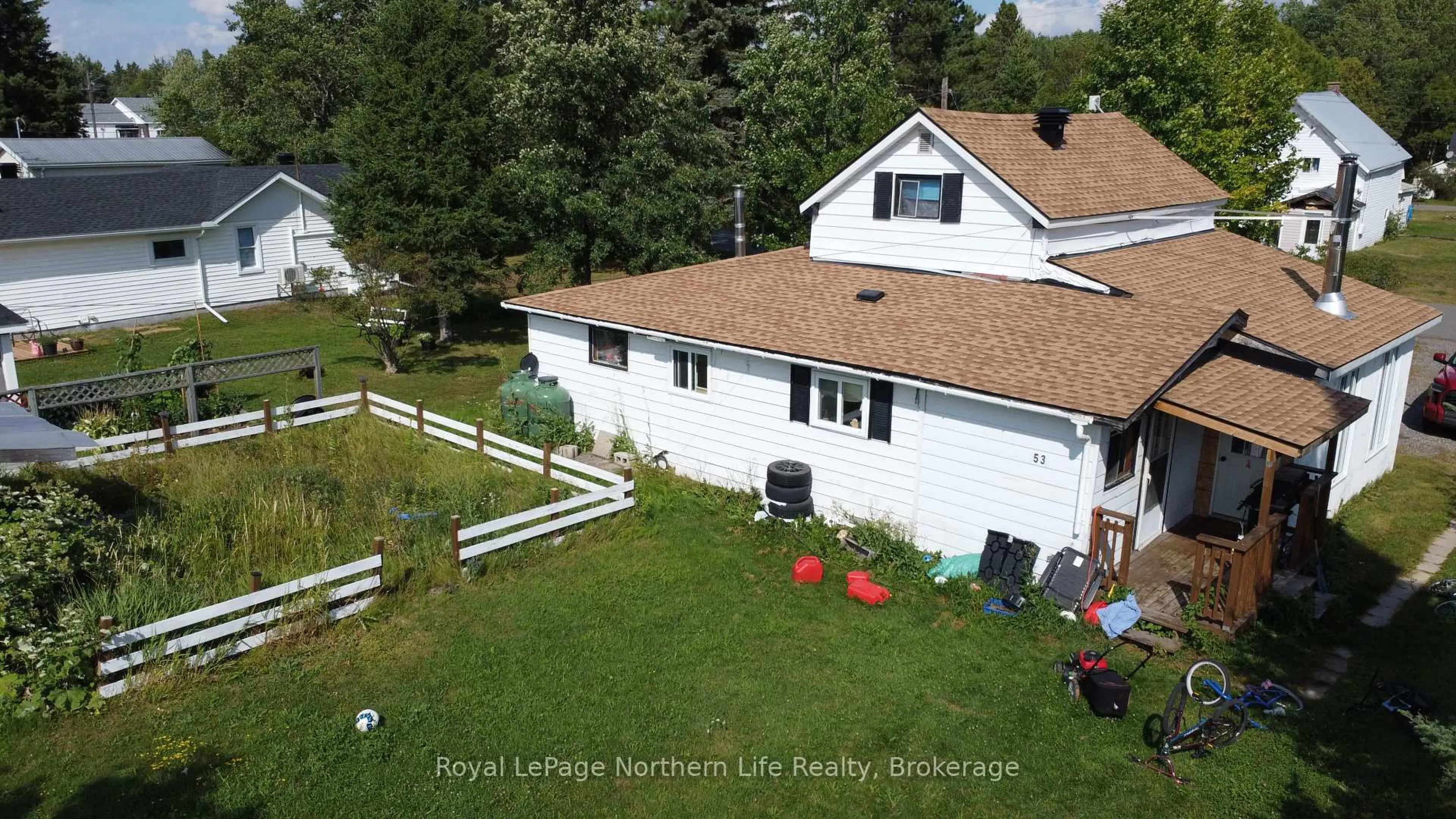 A pic from outside/outdoor area/front of a property/back of a property/a pic from drone, unknown for 53 Empire St, Timiskaming Ontario P0J 1N0