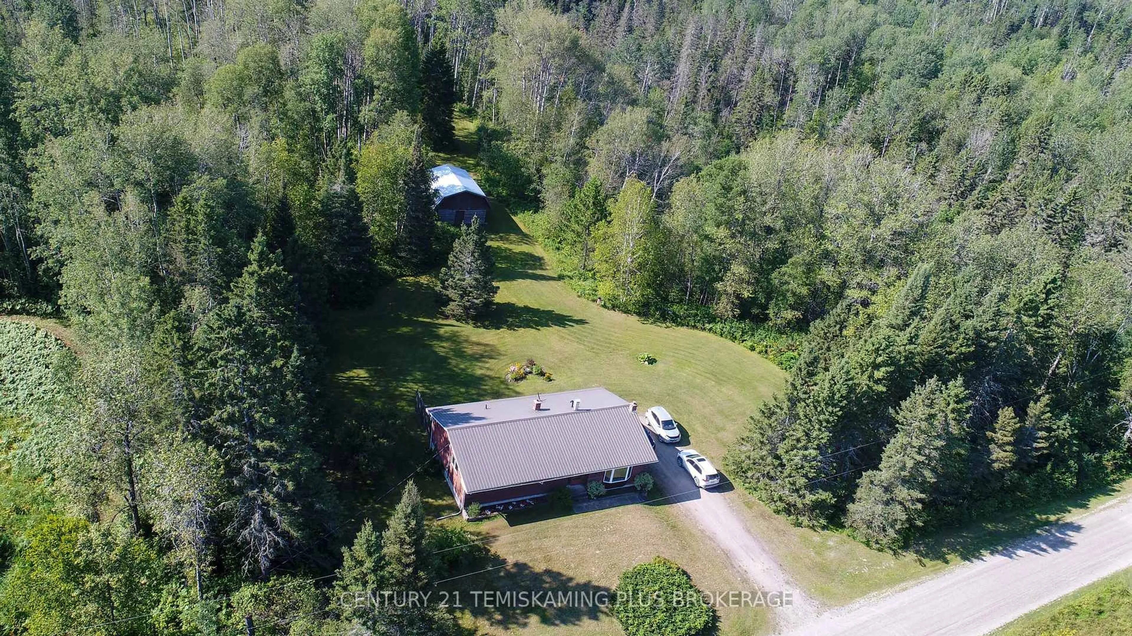 A pic from outside/outdoor area/front of a property/back of a property/a pic from drone, forest/trees view for 428120 Chamberlain 3 Rd, Englehart Ontario P0J 1H0
