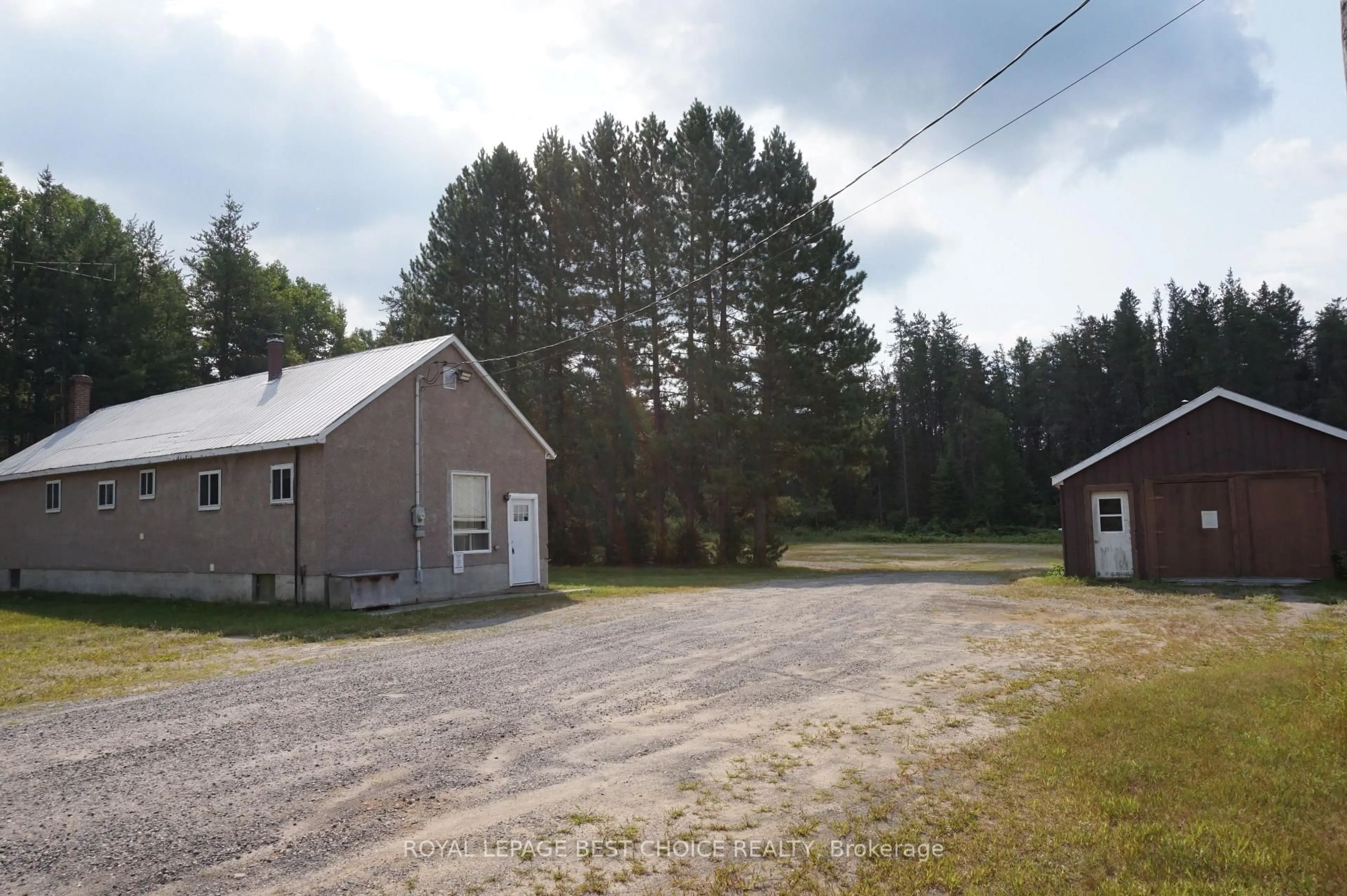 A pic from outside/outdoor area/front of a property/back of a property/a pic from drone, unknown for 918008 Portage Bay Rd, Timiskaming Ontario P0J 1C0