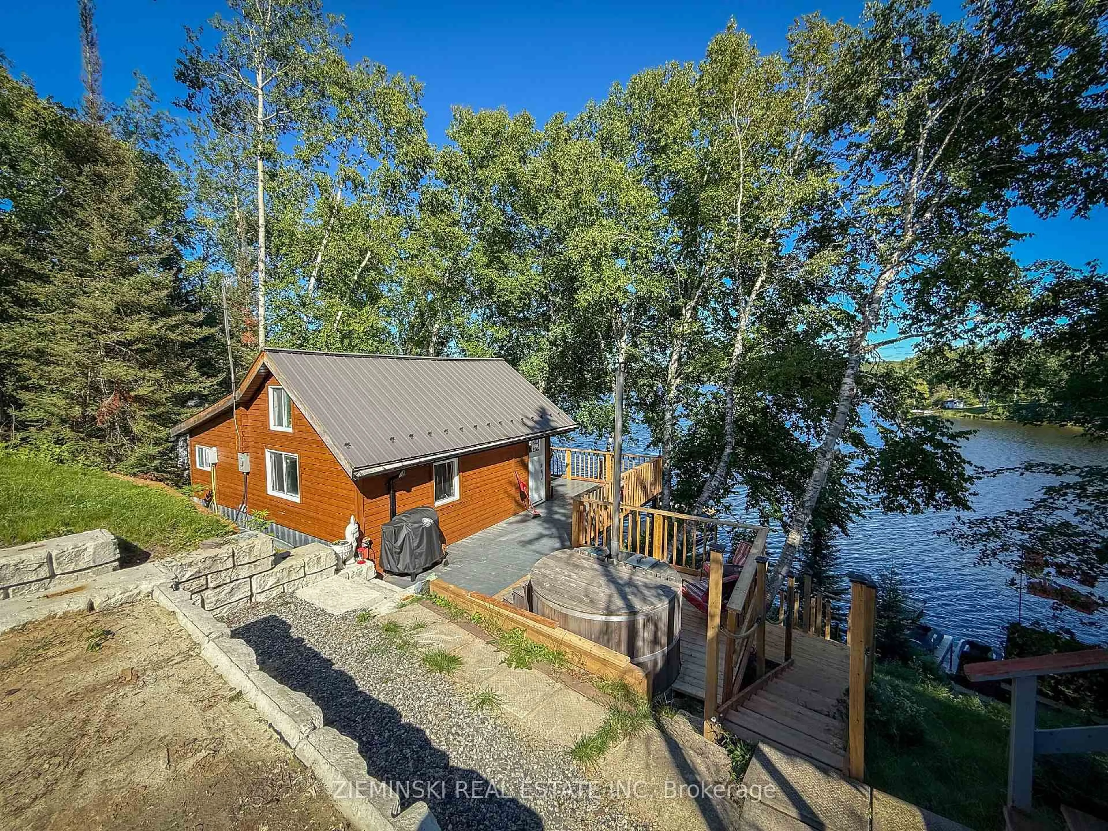 A pic from outside/outdoor area/front of a property/back of a property/a pic from drone, water/lake/river/ocean view for 438 Quirion (connaught) Rd, Timmins Ontario P0N 1A0