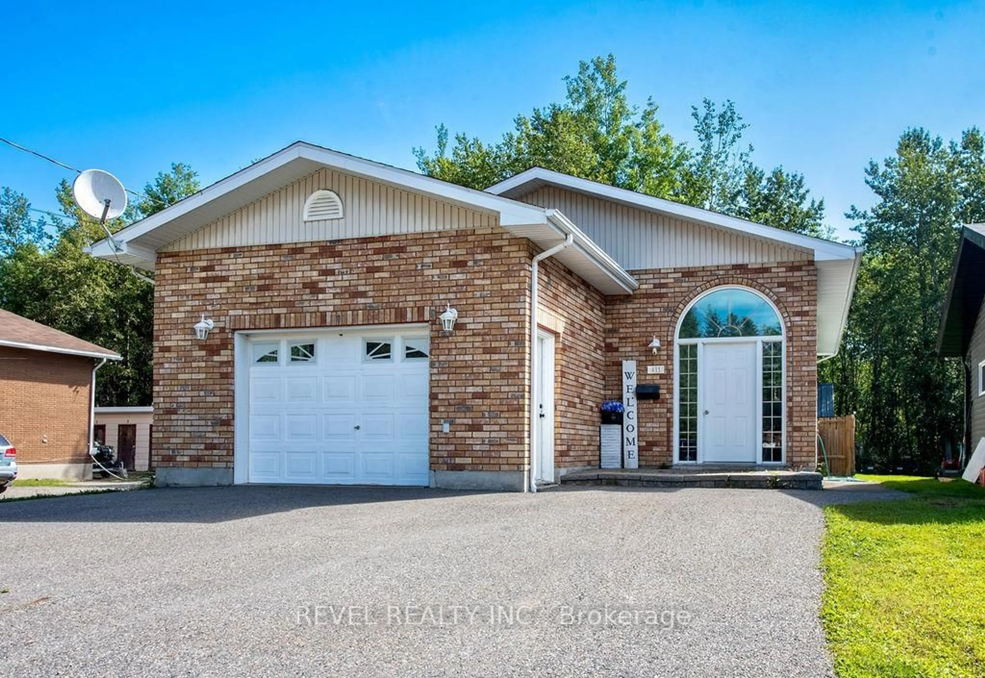 Home with brick exterior material, street for 411 Krznaric St, Timmins Ontario P0N 1C0