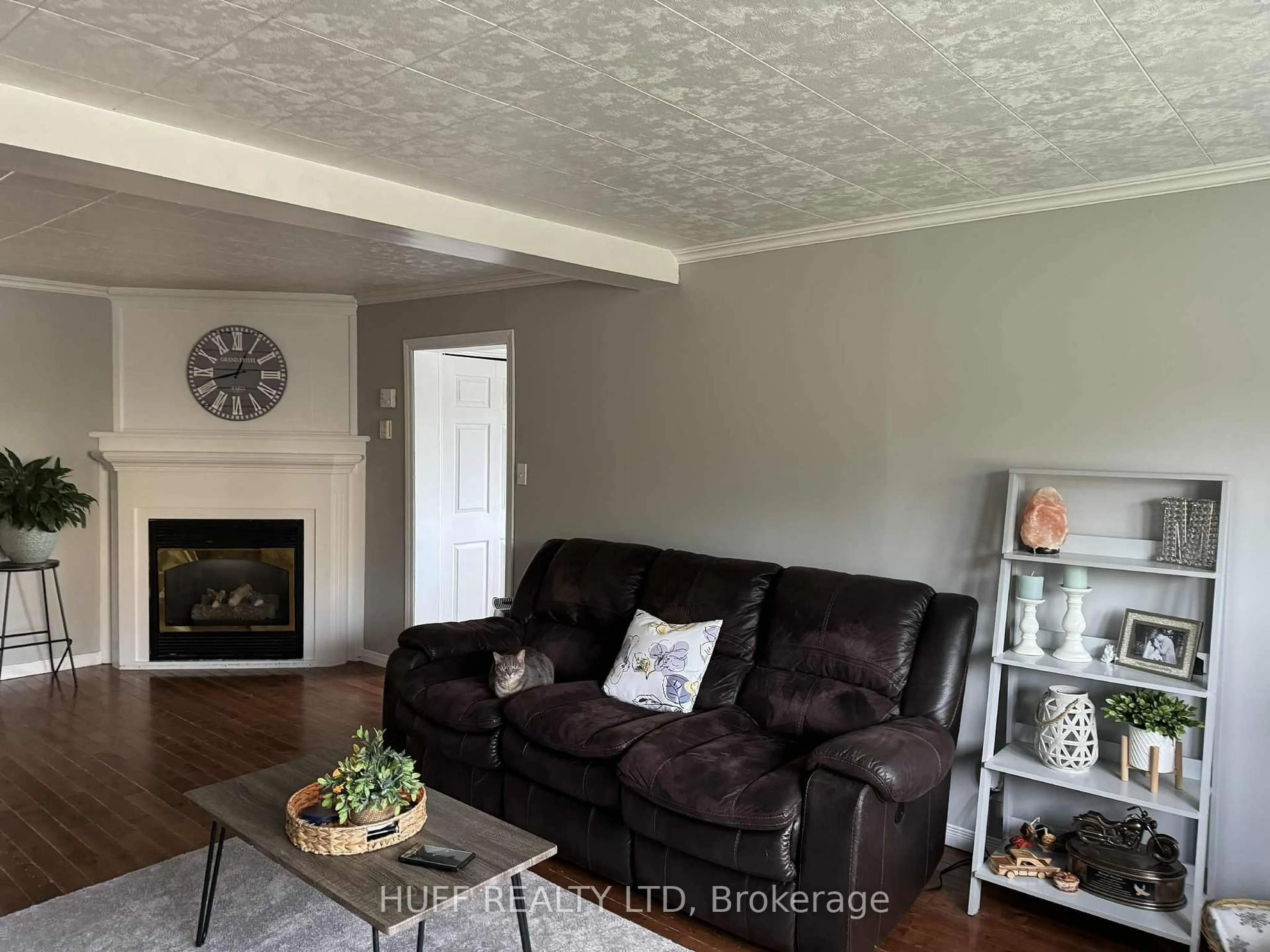 Living room with furniture, wood/laminate floor for 280 Hayes St, Kirkland Lake Ontario P0K 1T0