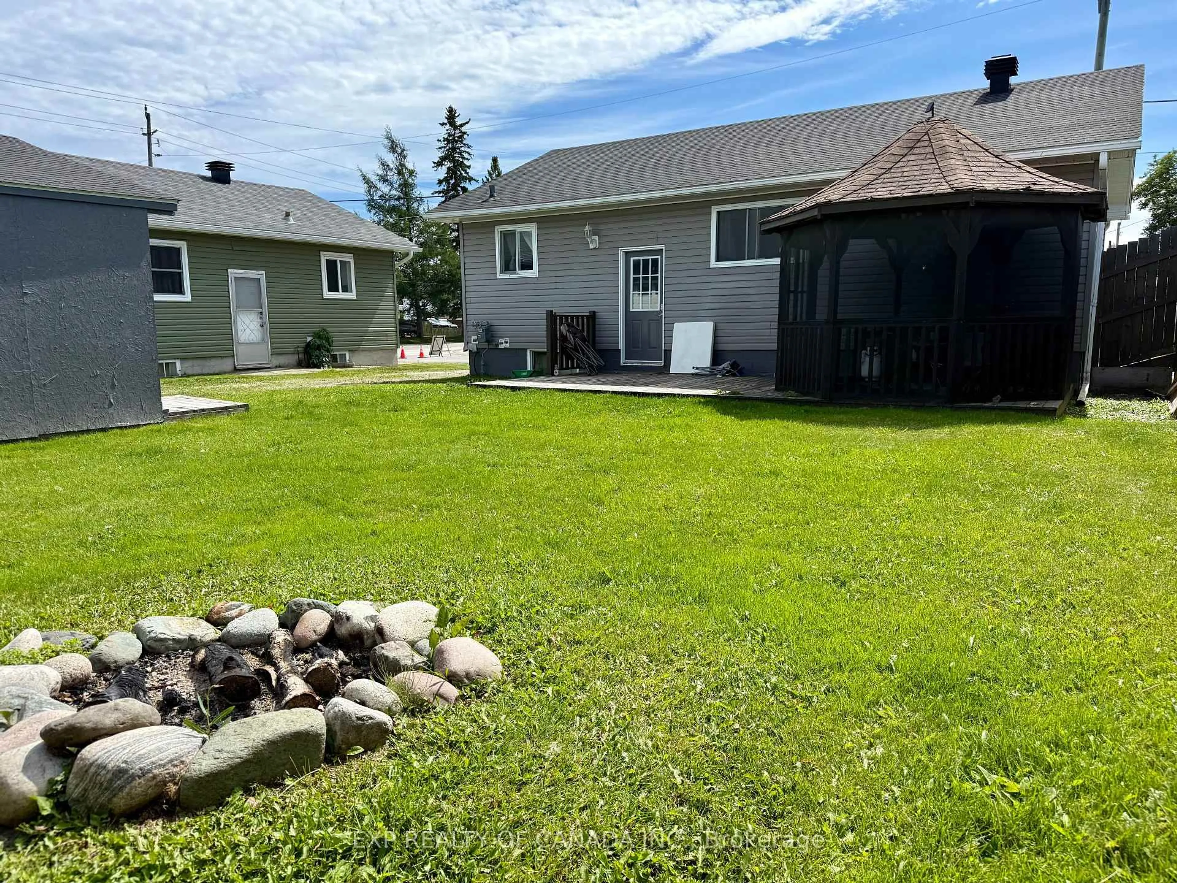 A pic from outside/outdoor area/front of a property/back of a property/a pic from drone, unknown for 32 William Ave, Timmins Ontario P0N 1H0