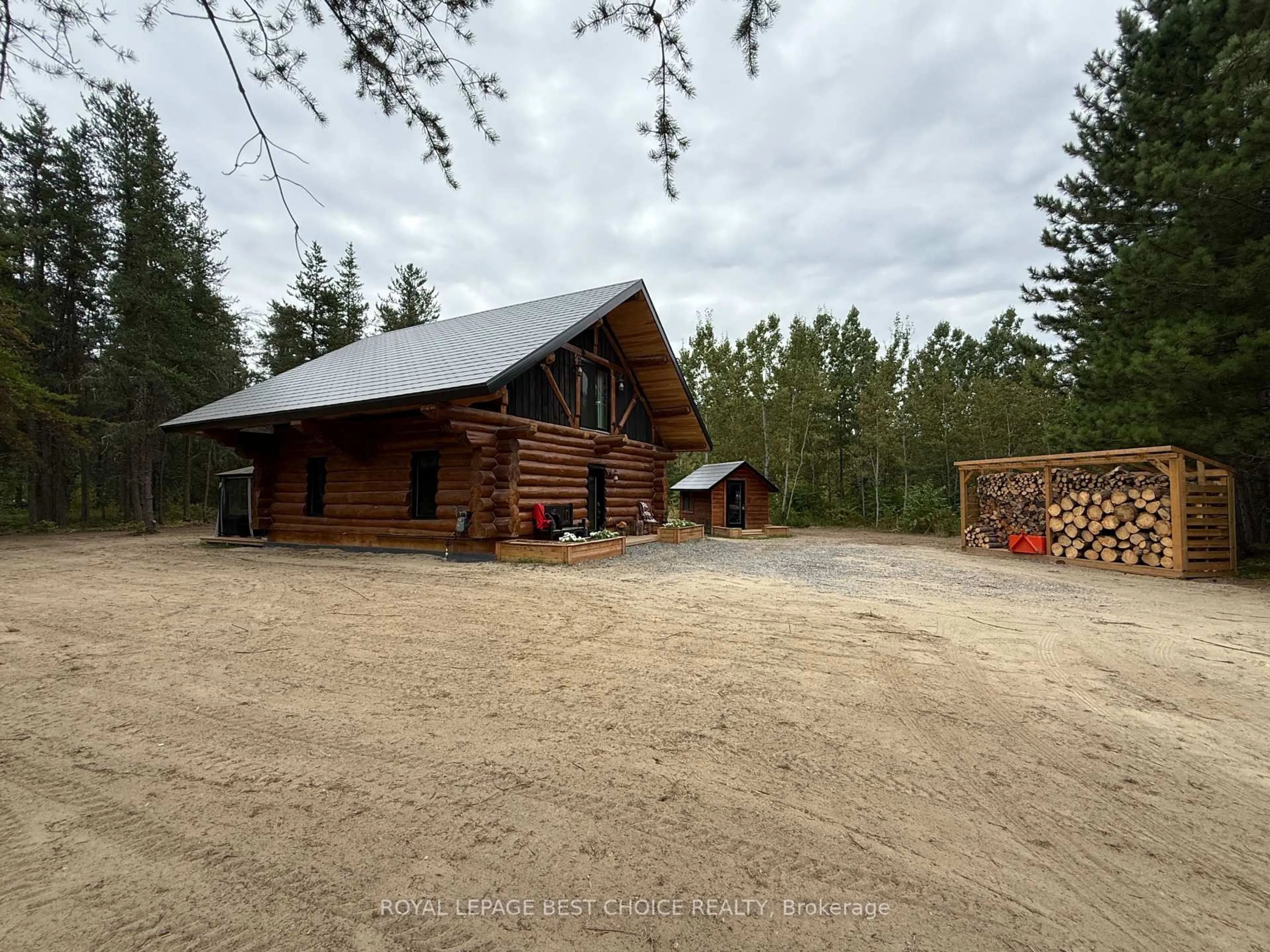 A pic from outside/outdoor area/front of a property/back of a property/a pic from drone, building for 505540 Airport Rd, Timiskaming Ontario P0J 1C0