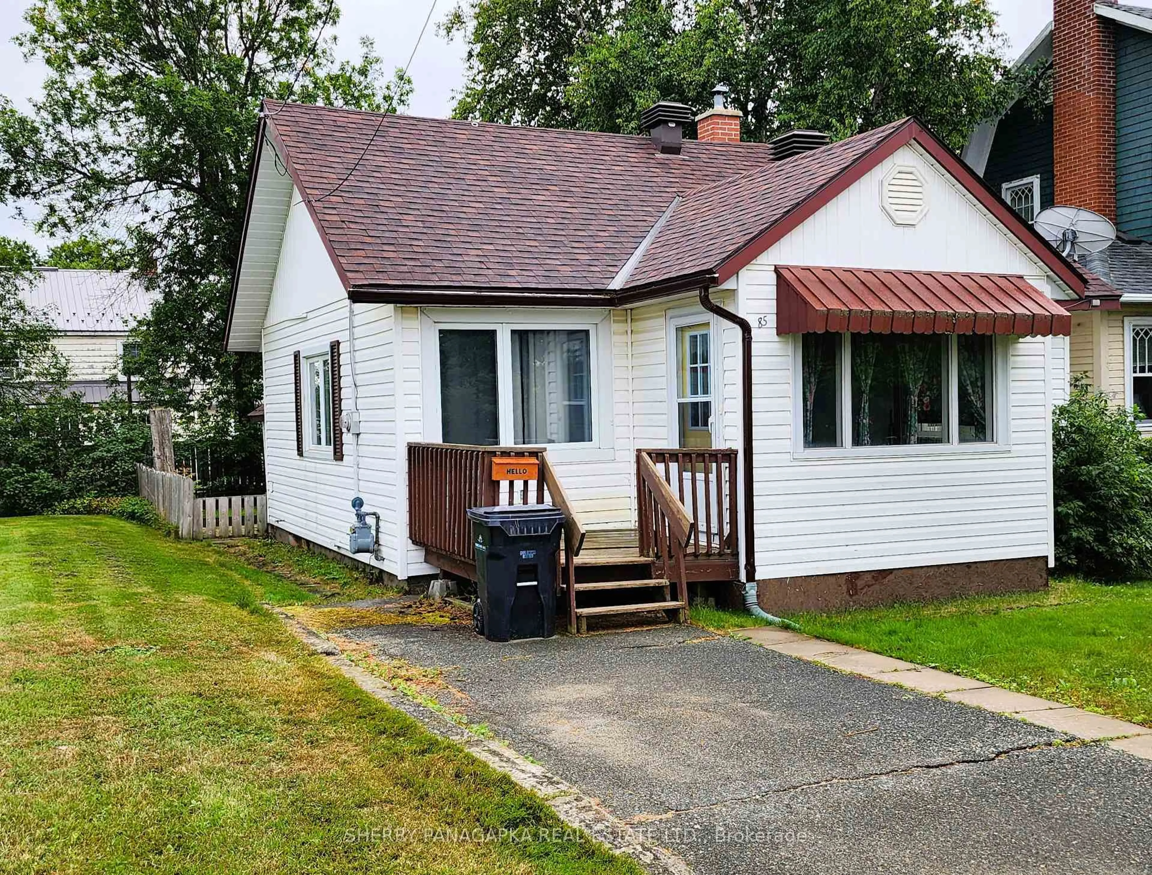 Home with vinyl exterior material, street for 85 Government Rd, Kirkland Lake Ontario P2N 1A6