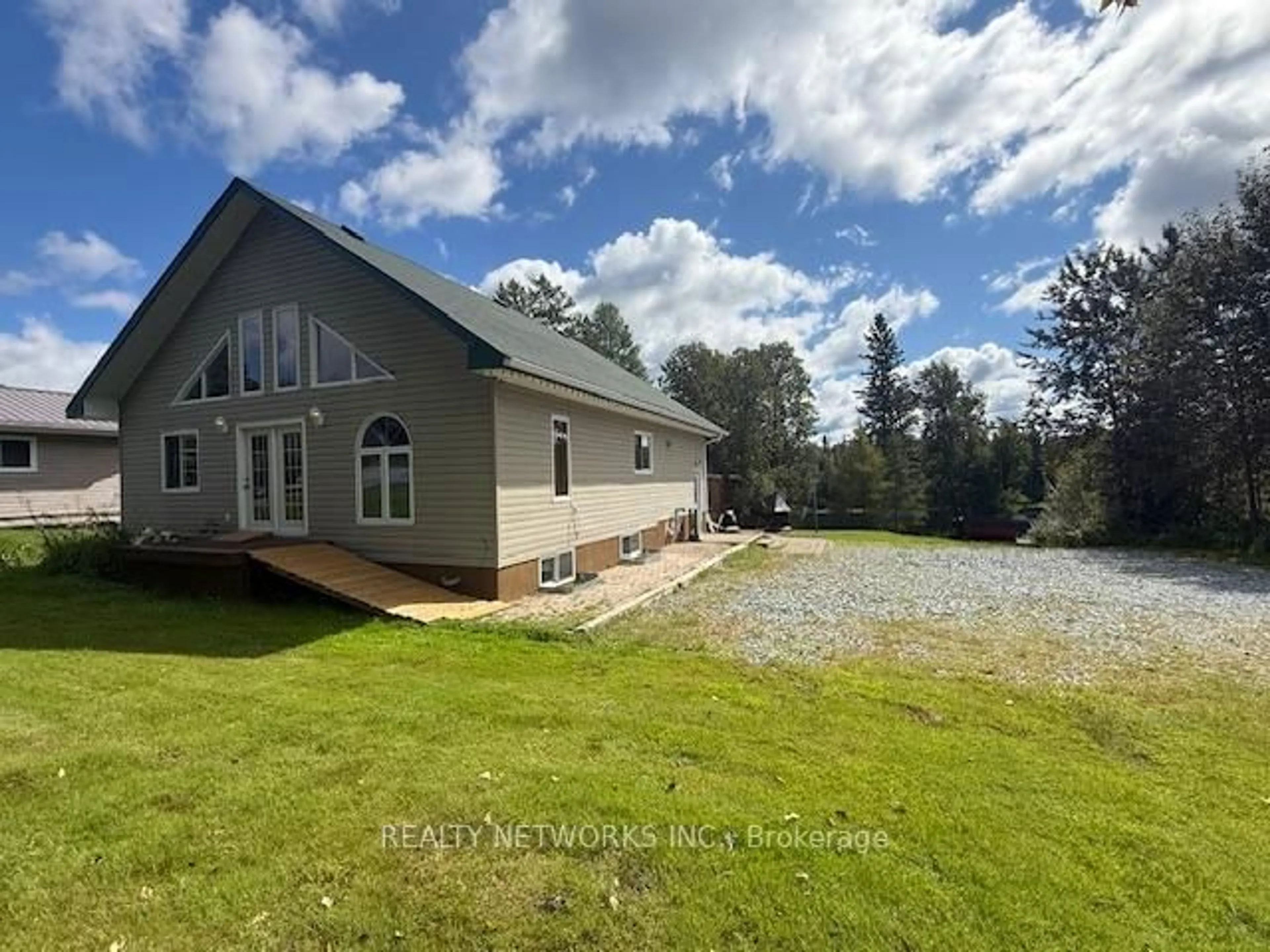 A pic from outside/outdoor area/front of a property/back of a property/a pic from drone, water/lake/river/ocean view for 268 Wallingford Rd, Timmins Ontario P4N 7C3