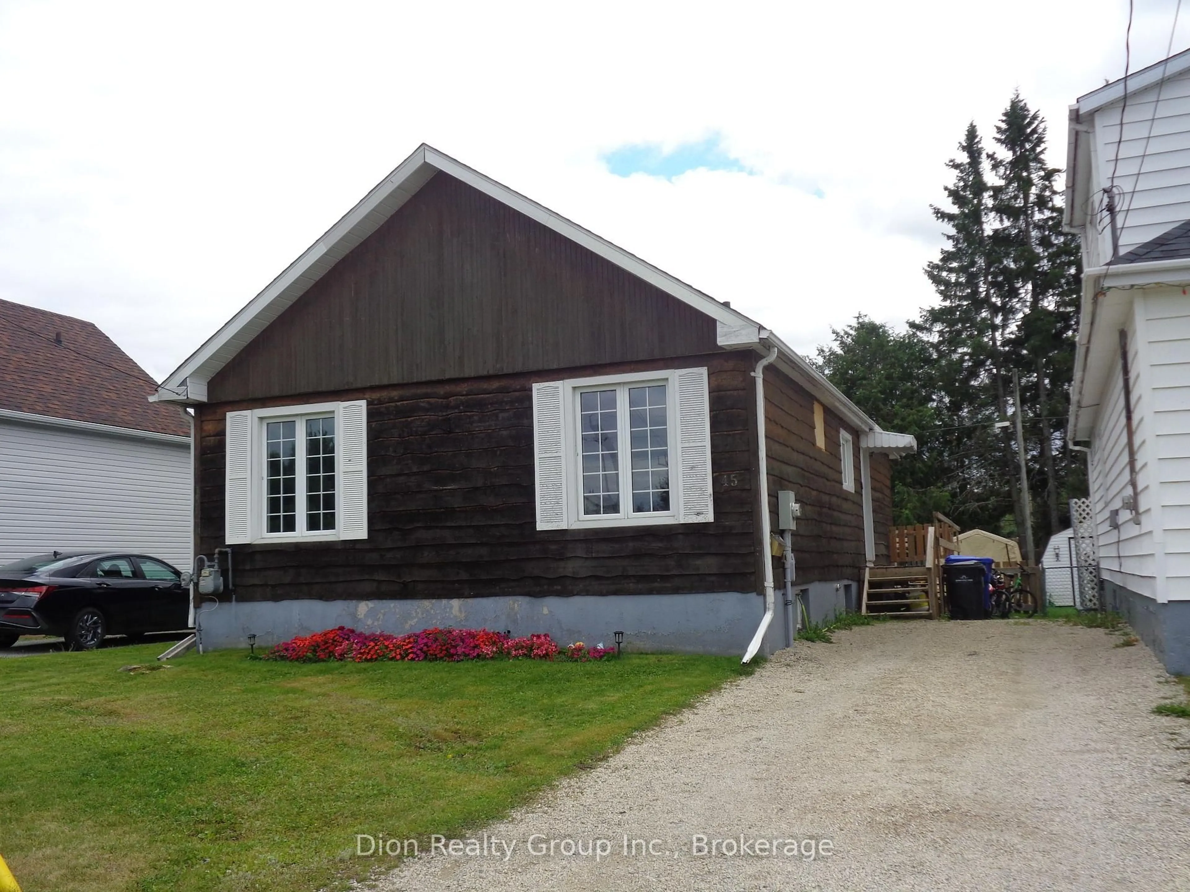 Home with vinyl exterior material, street for 45 Premier Ave, Kirkland Lake Ontario P2N 2S7