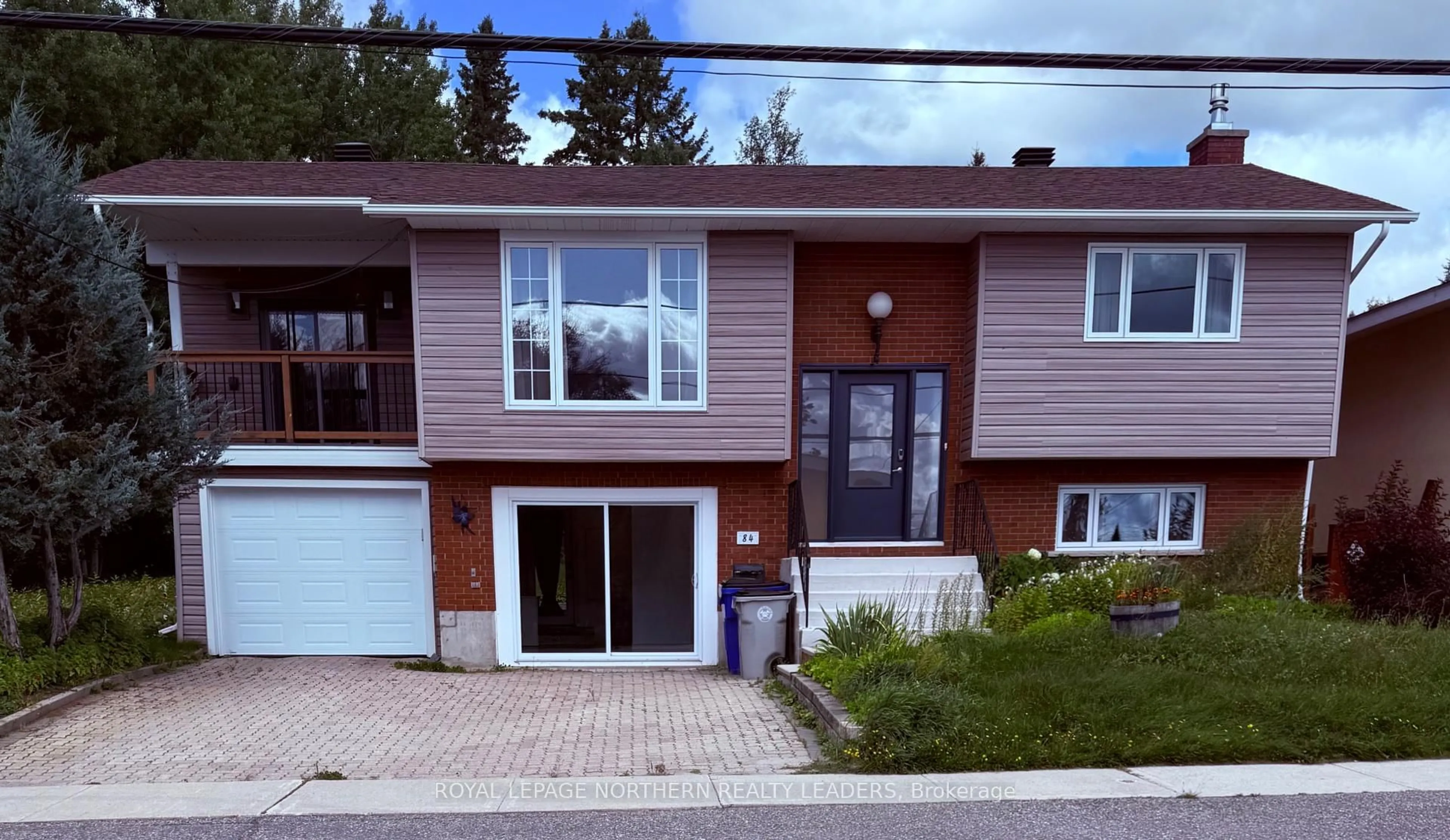 Home with vinyl exterior material, street for 84 Brousseau Ave, Timmins Ontario P4N 5Y2